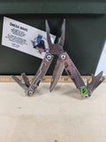 Leatherman Rev #-56 Dirty, possible rust, knife dinged