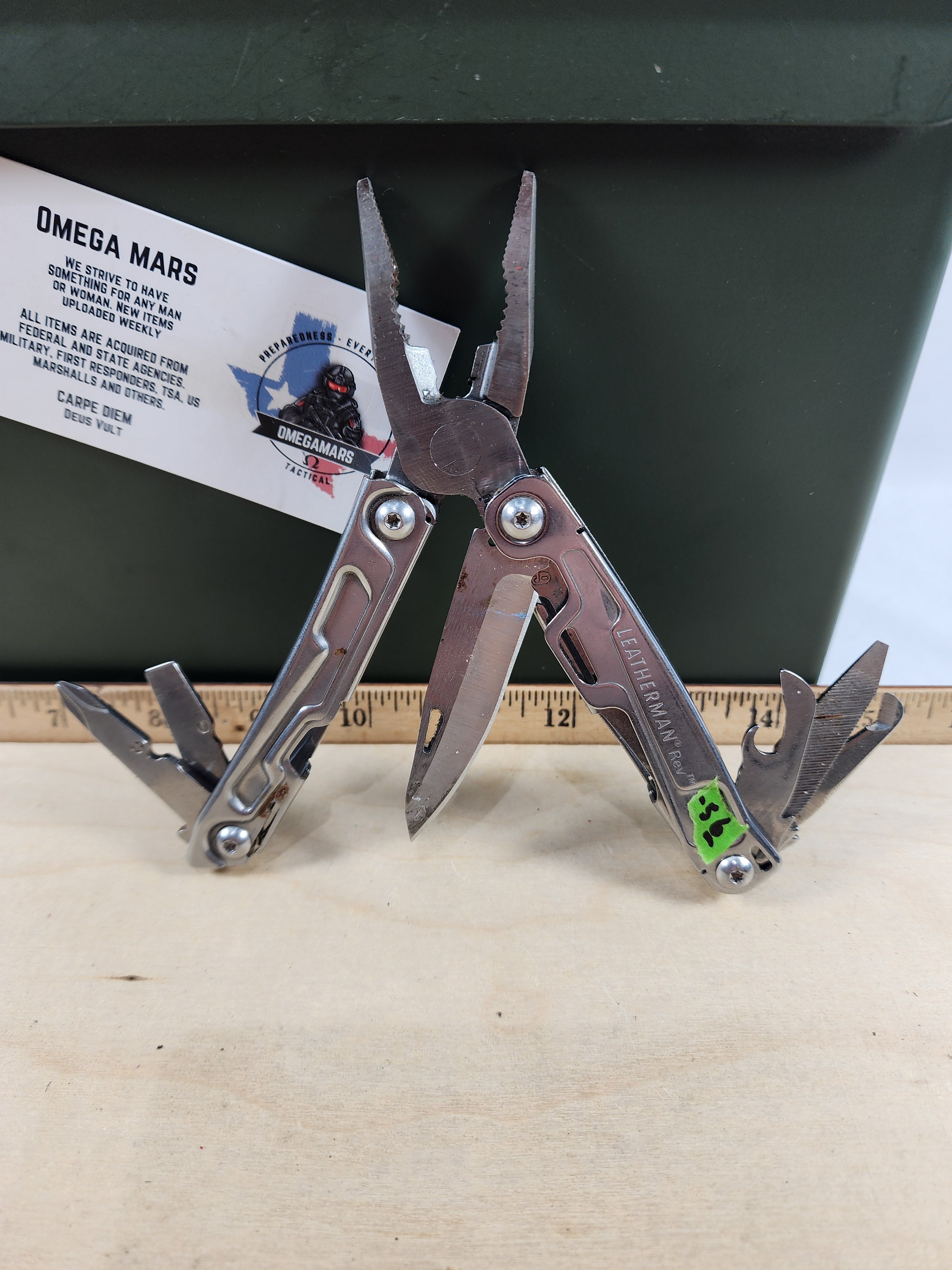 Leatherman Rev #-56 Dirty, possible rust, knife dinged
