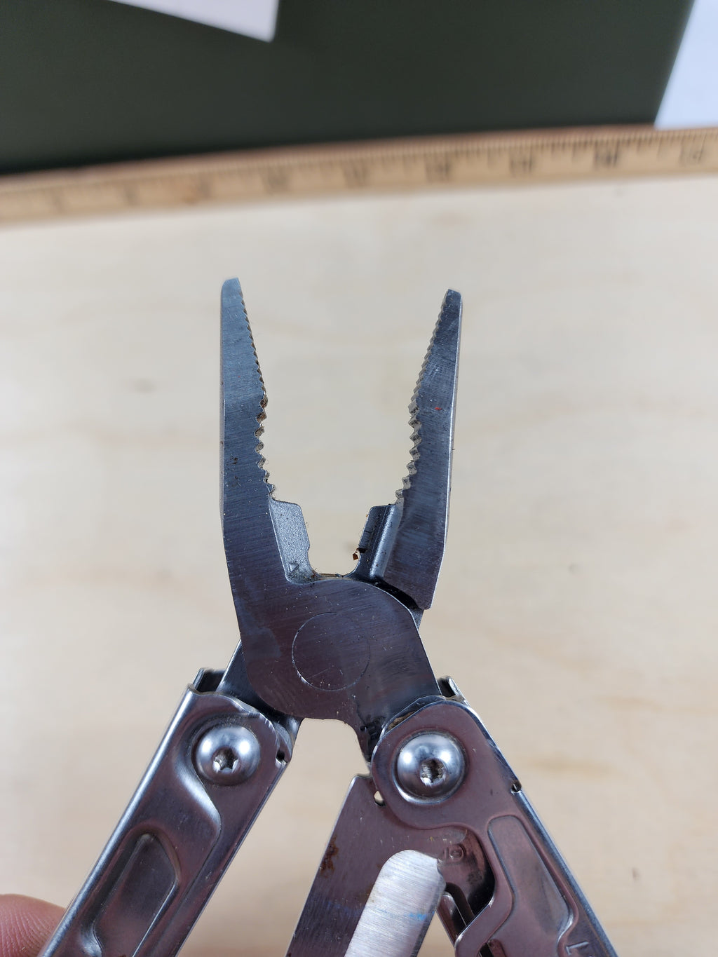 Leatherman Rev #-56 Dirty, possible rust, knife dinged