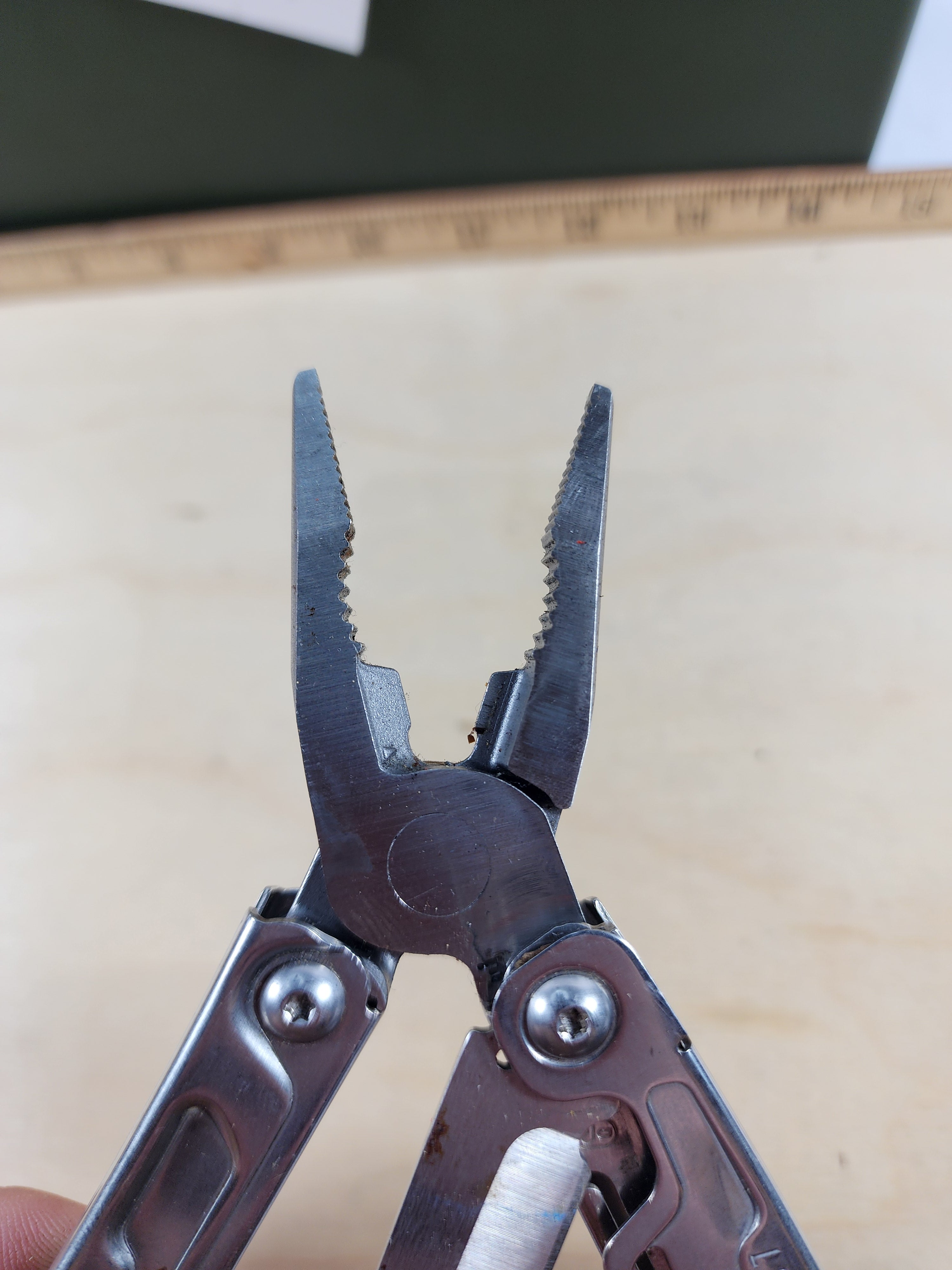 Leatherman Rev #-56 Dirty, possible rust, knife dinged