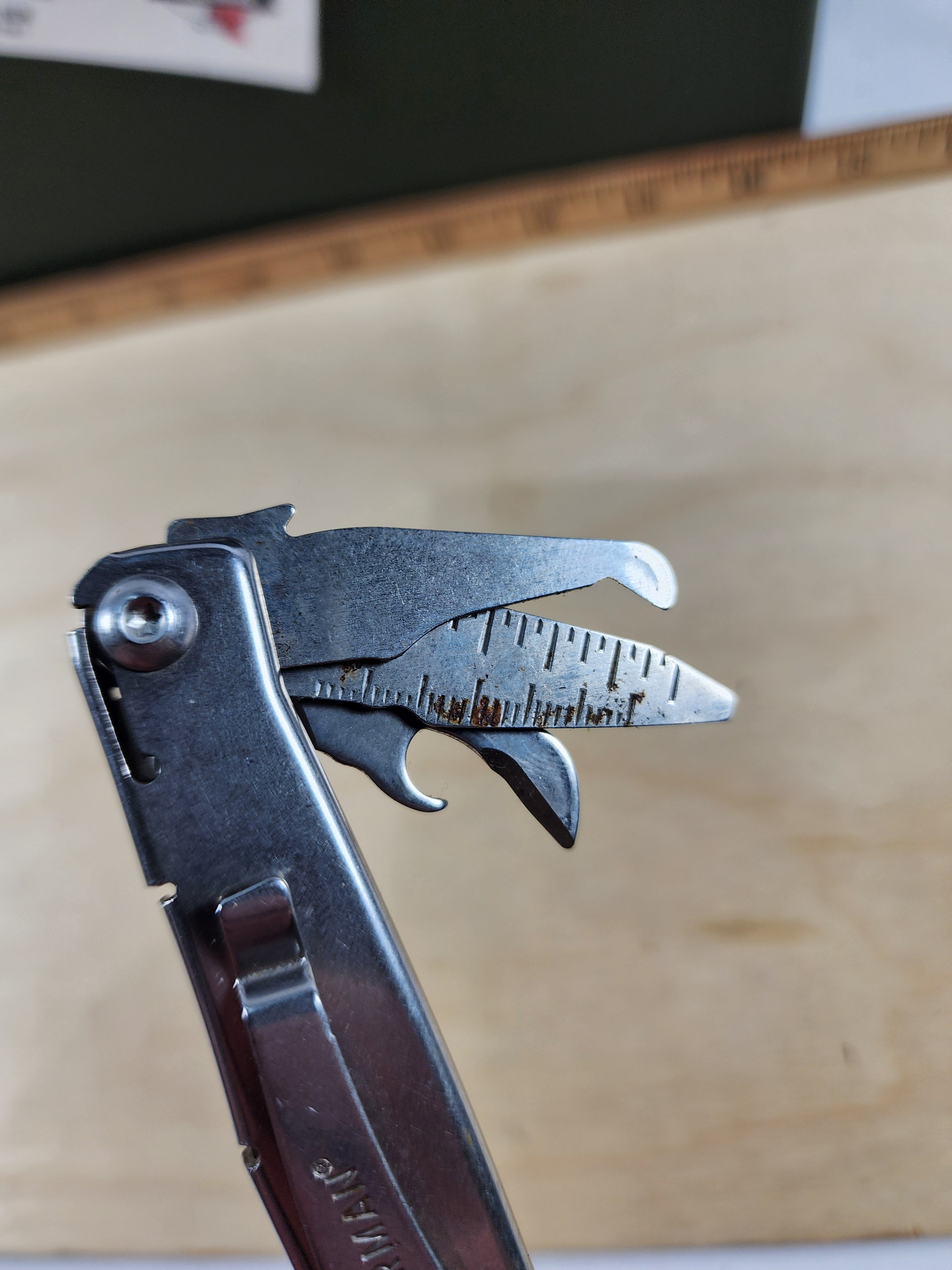 Leatherman Rev #-56 Dirty, possible rust, knife dinged
