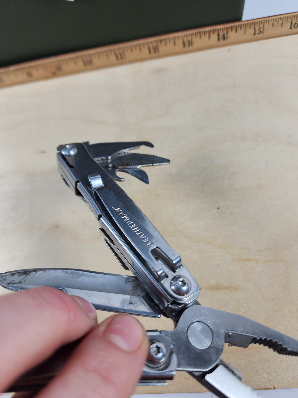 Leatherman Rev #-56 Dirty, possible rust, knife dinged