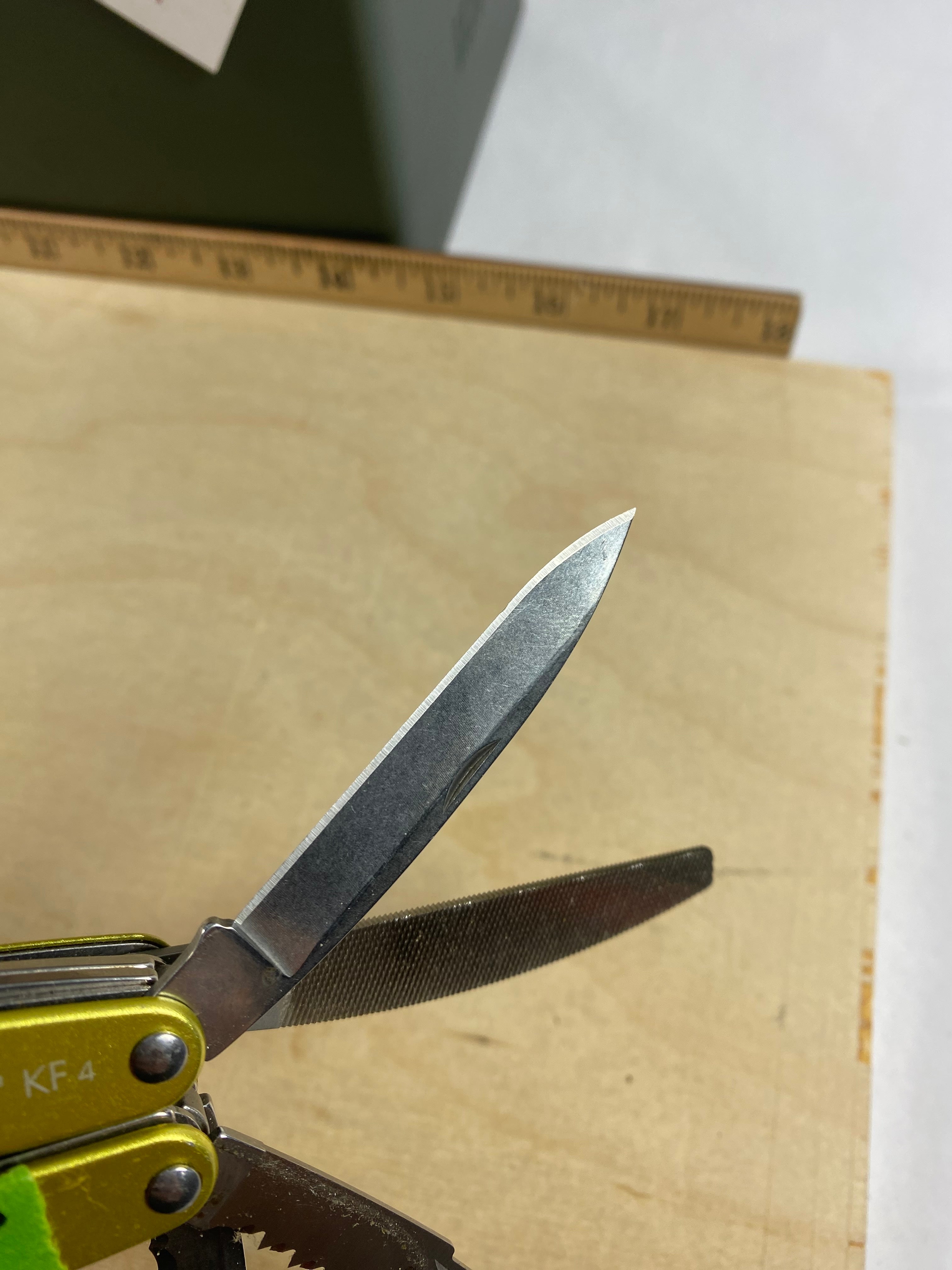 Leatherman Juice KF4 #108. Light usage. Chip on blade