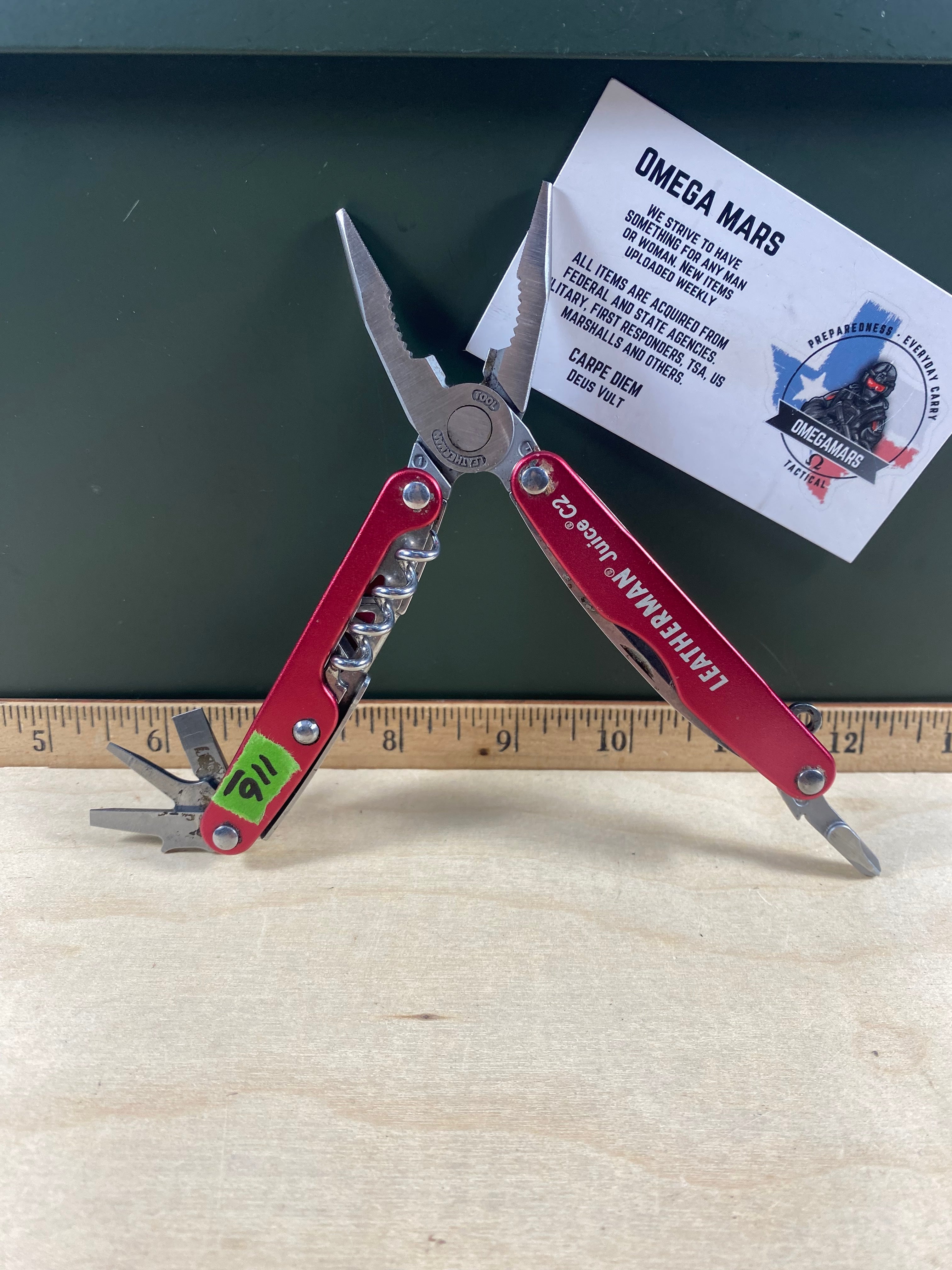 Leatherman Juice C2 #116. Light usage. Needs oil. Dirty and possible rust