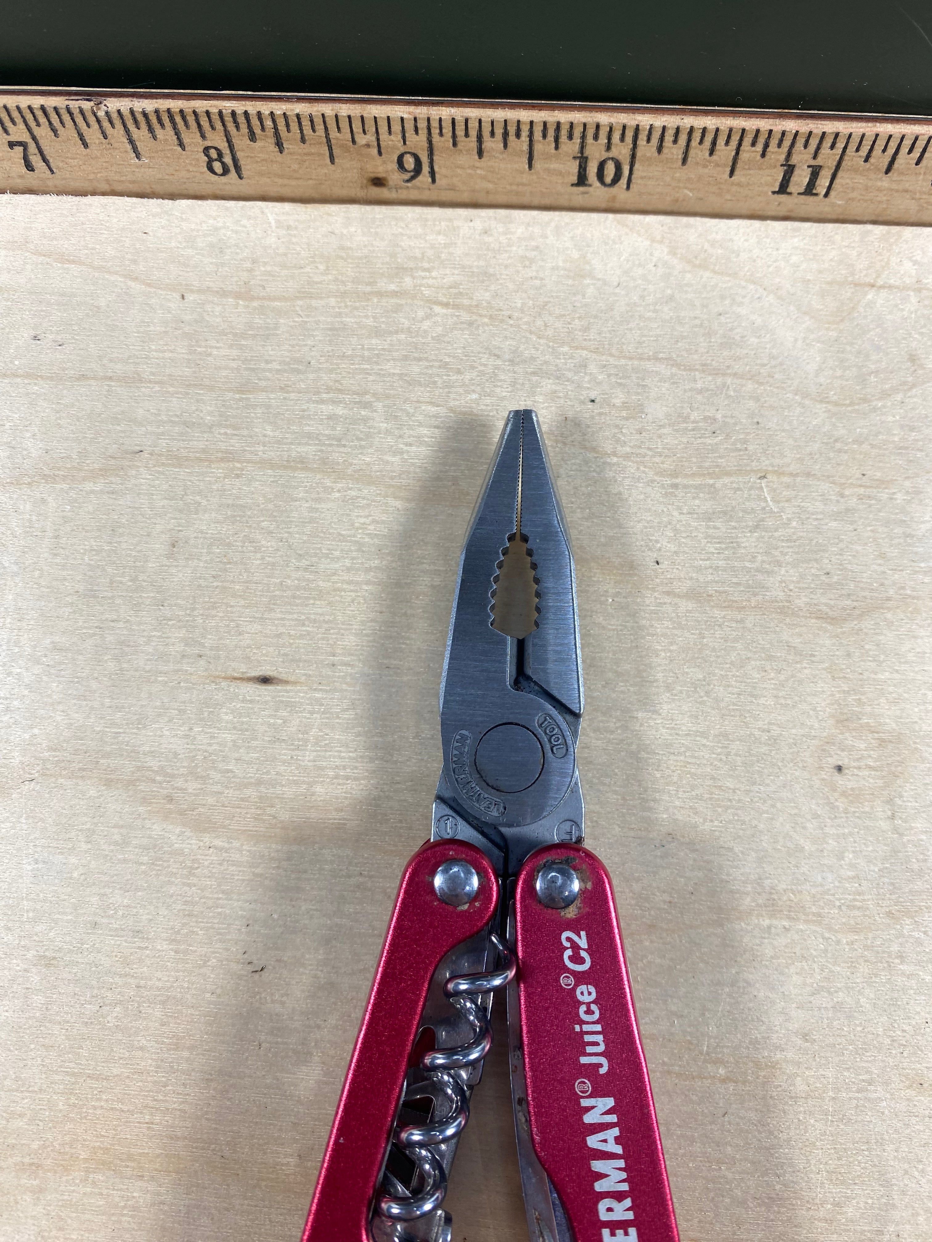 Leatherman Juice C2 #116. Light usage. Needs oil. Dirty and possible rust