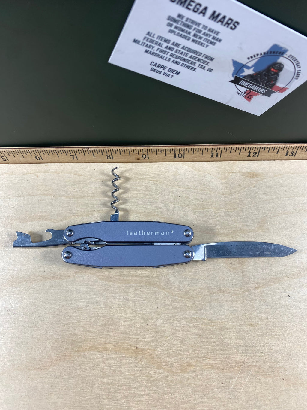 Leatherman juice C2 #118. Light usage. Chips on blade.