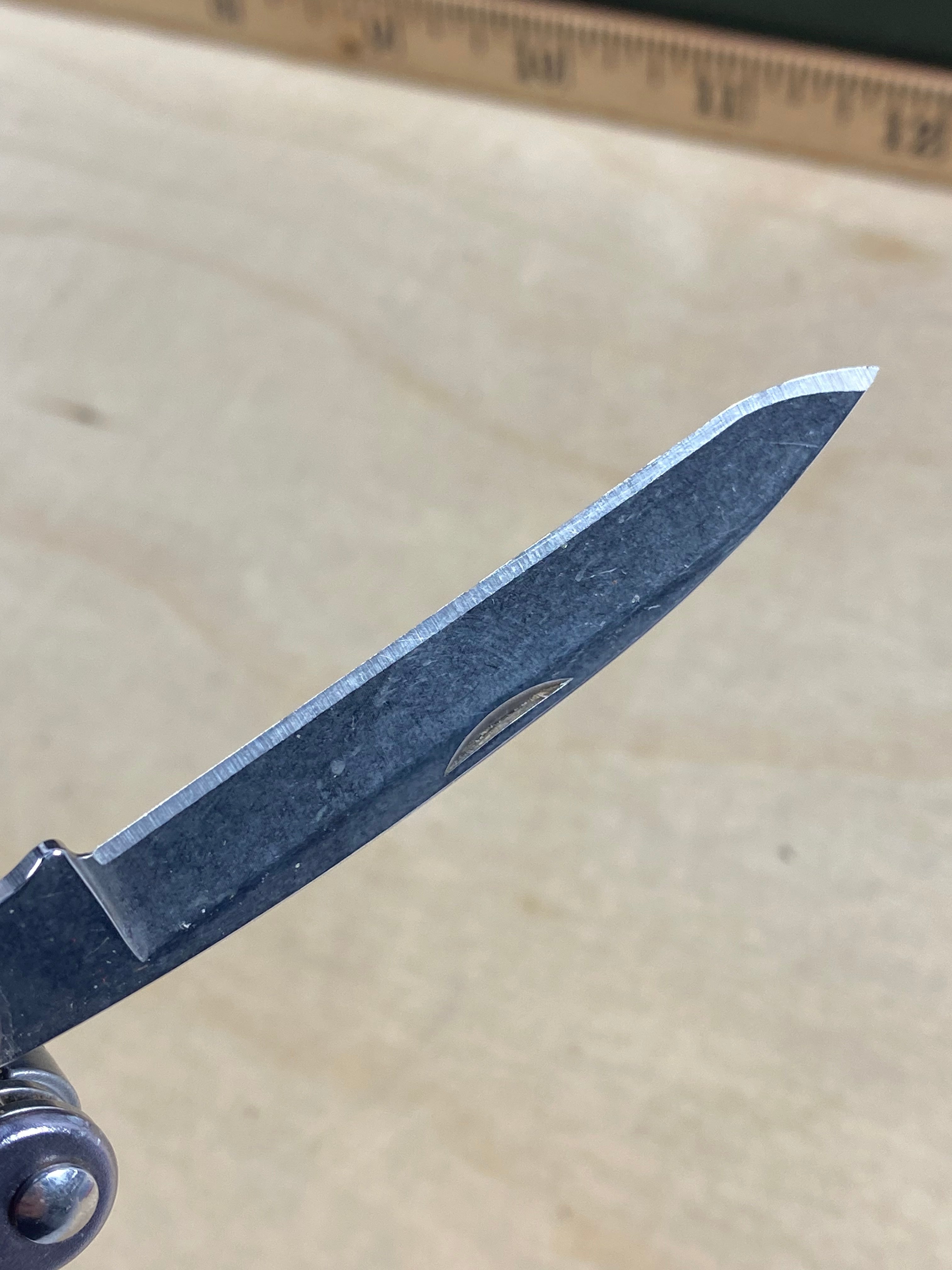 Leatherman juice C2 #118. Light usage. Chips on blade.