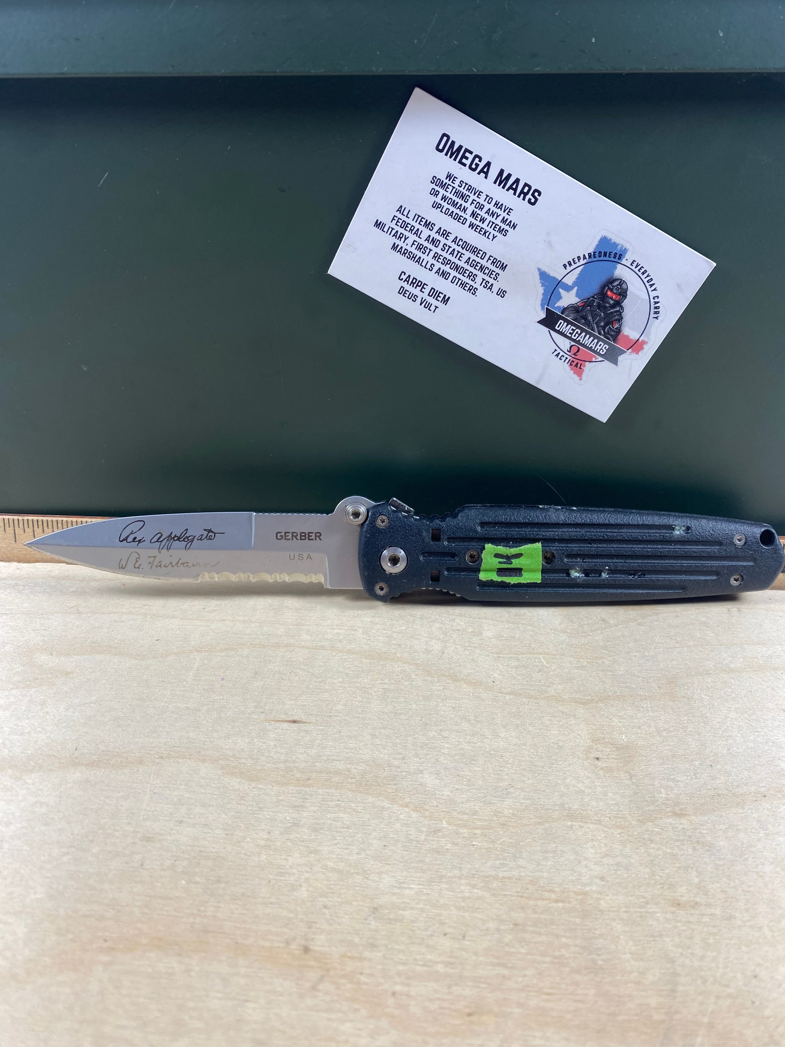 Gerber #14 Applegate Combat Folder Serrated. Light usage. Dirty