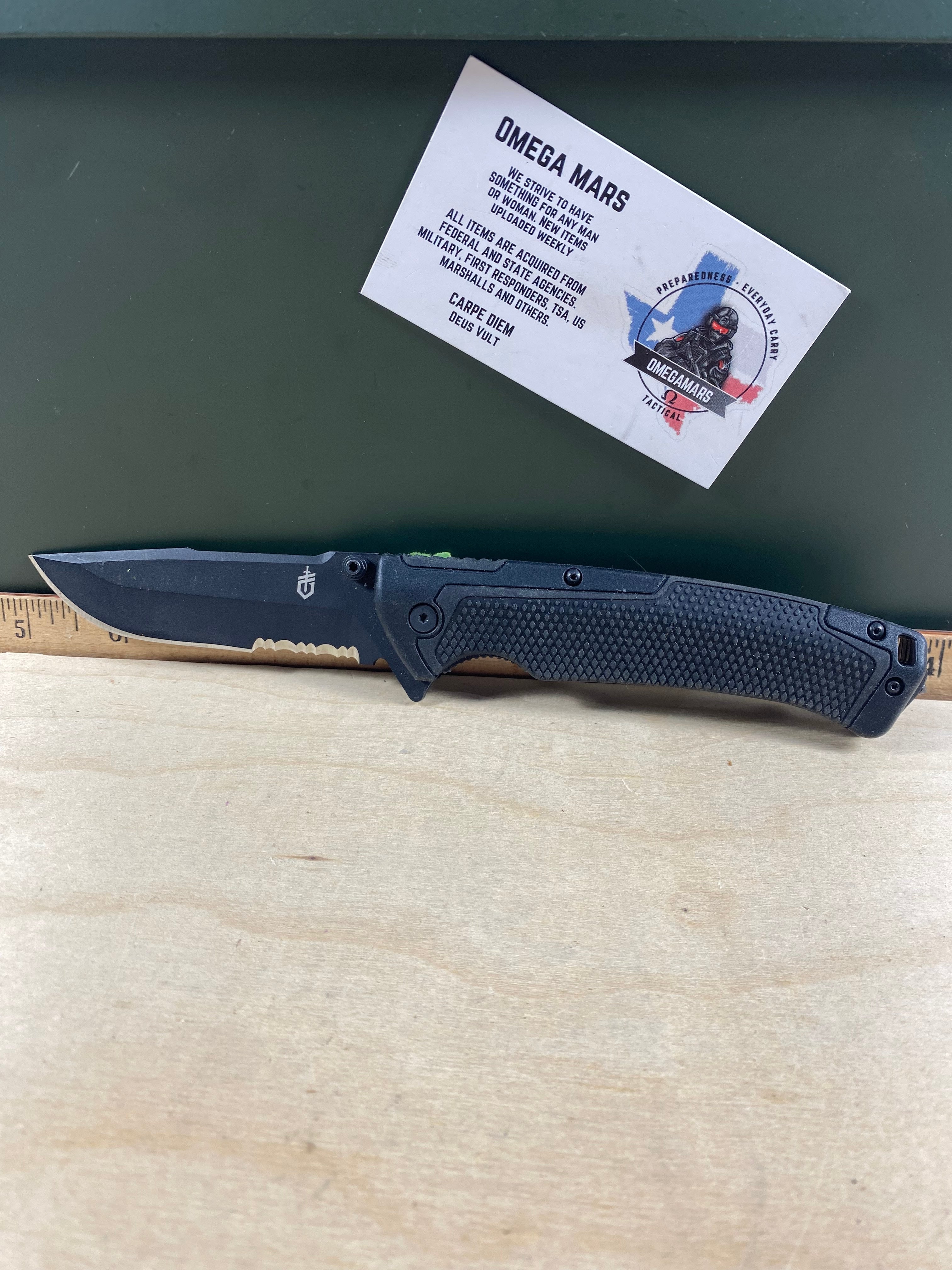 Gerber #101 Decree Liner Lock Knife. Light usage. Pocket clip is loose