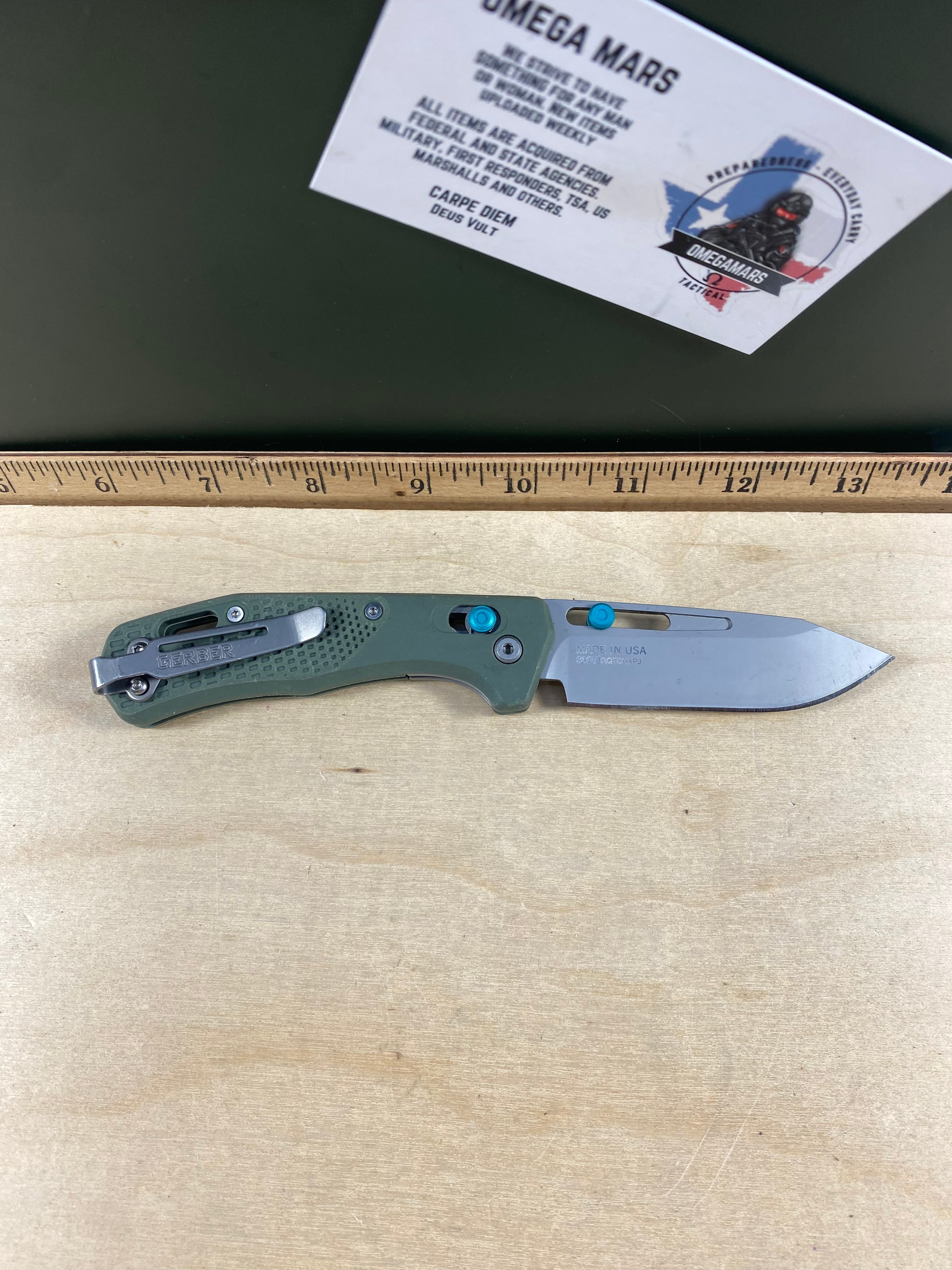 Gerber #108 Assert Green. Light usage and pocket clip loose. (MSRP $199.99 NEW)