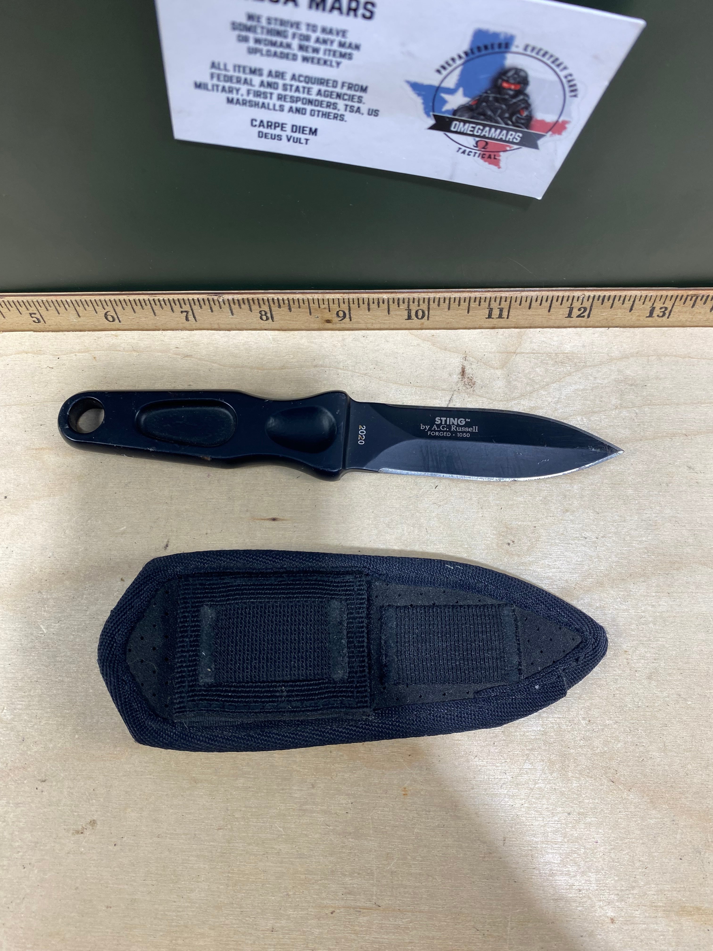 CRKT 2020 Sting #100. Light usage. Resharpened.