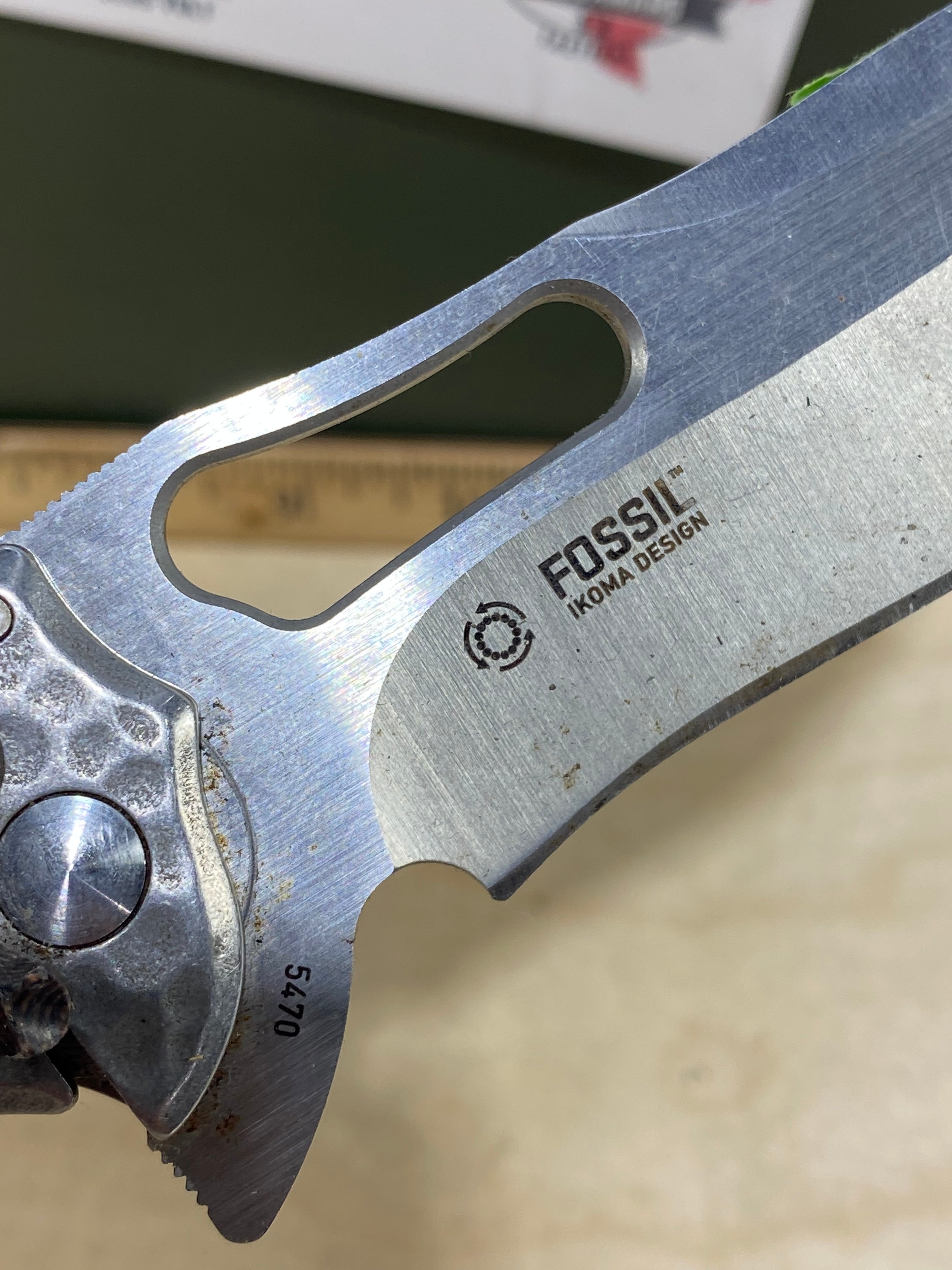 CRKT 5470 Fosil #117. Light usage.