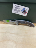 CRKT 5470 Fosil #124. Light usage. Chip on blade