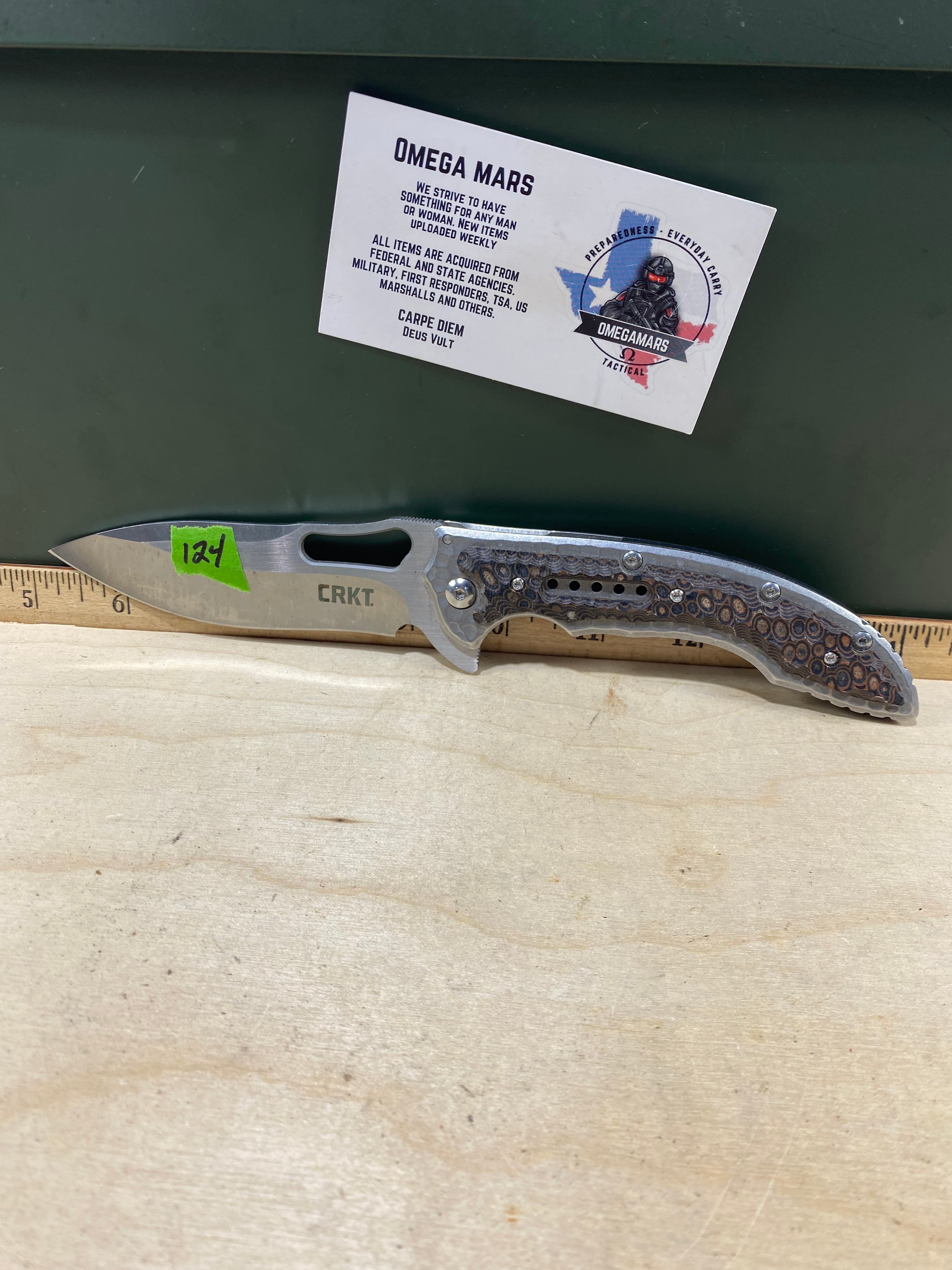 CRKT 5470 Fosil #124. Light usage. Chip on blade