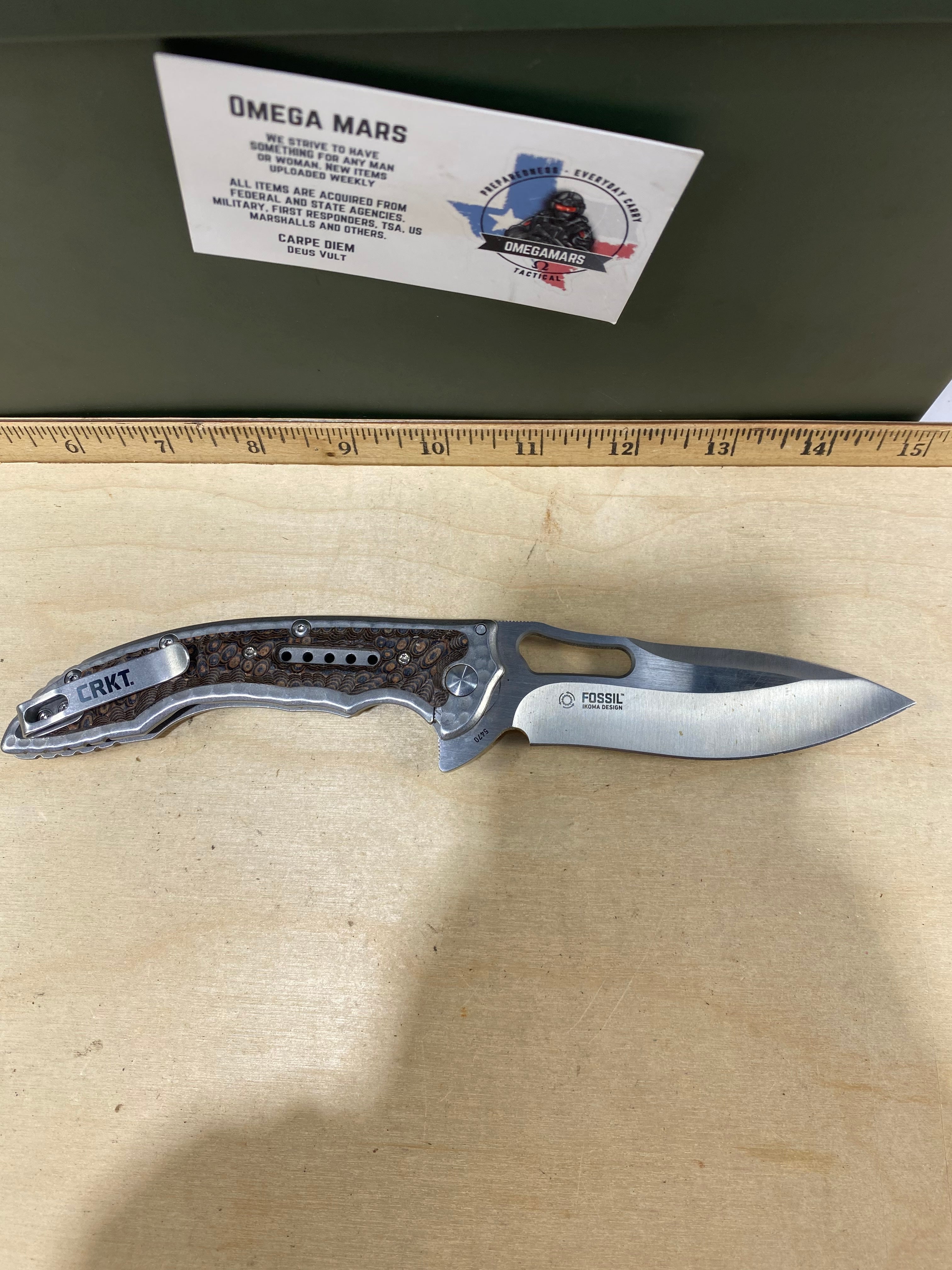 CRKT 5470 Fosil #124. Light usage. Chip on blade