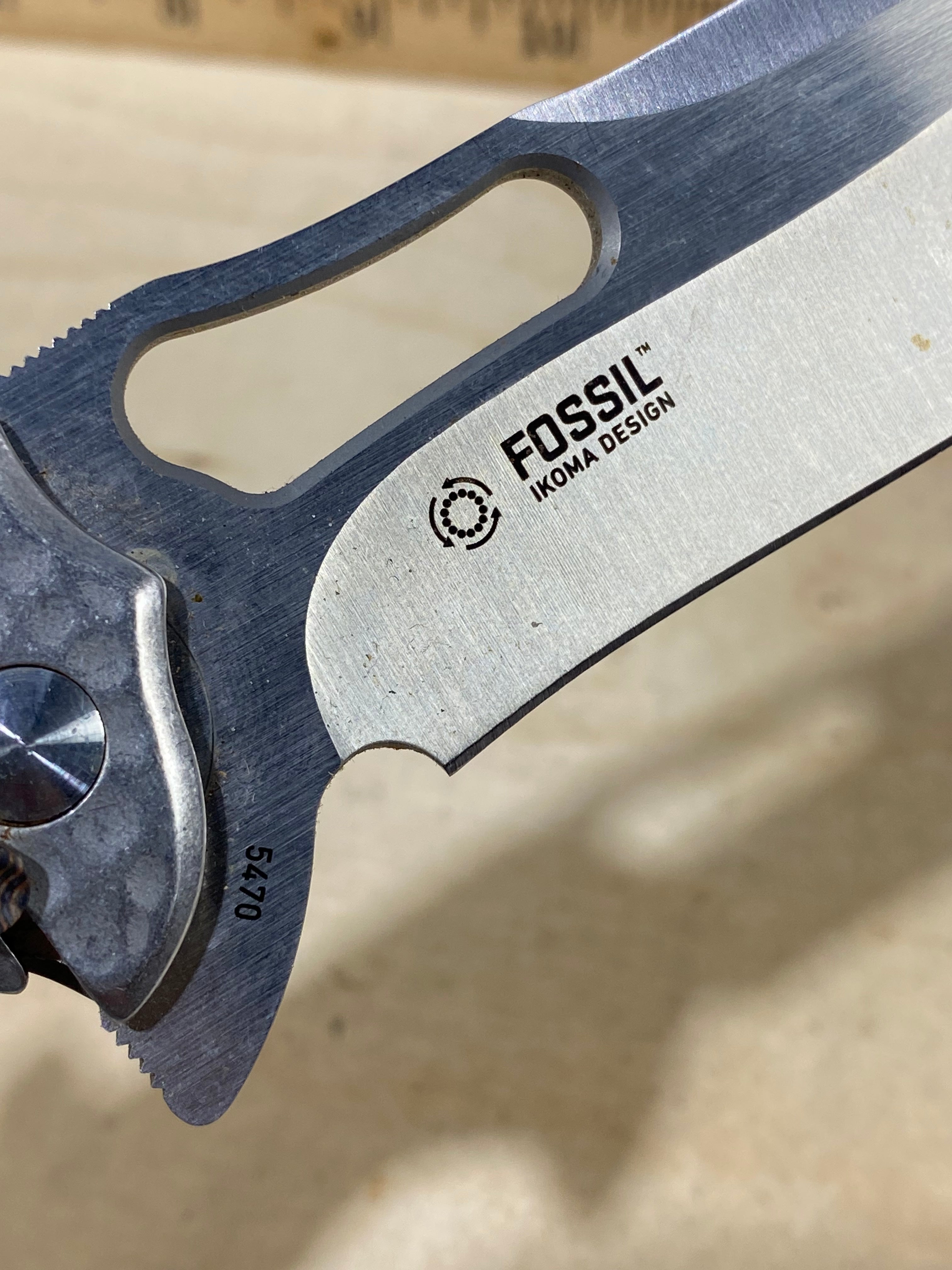 CRKT 5470 Fosil #124. Light usage. Chip on blade