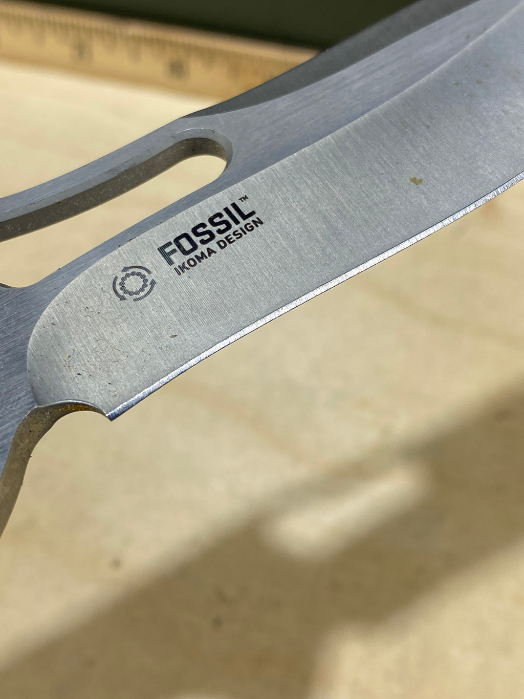 CRKT 5470 Fosil #124. Light usage. Chip on blade