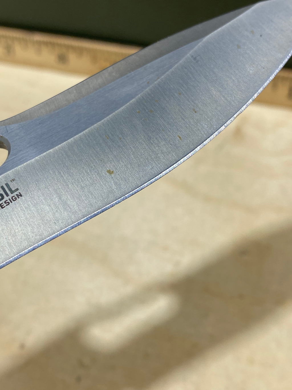 CRKT 5470 Fosil #124. Light usage. Chip on blade