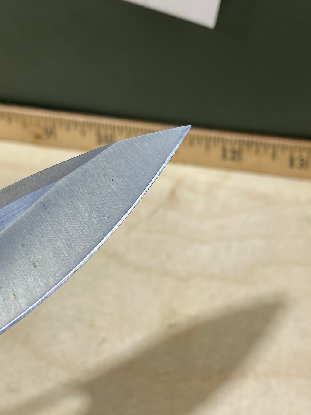 CRKT 5470 Fosil #124. Light usage. Chip on blade