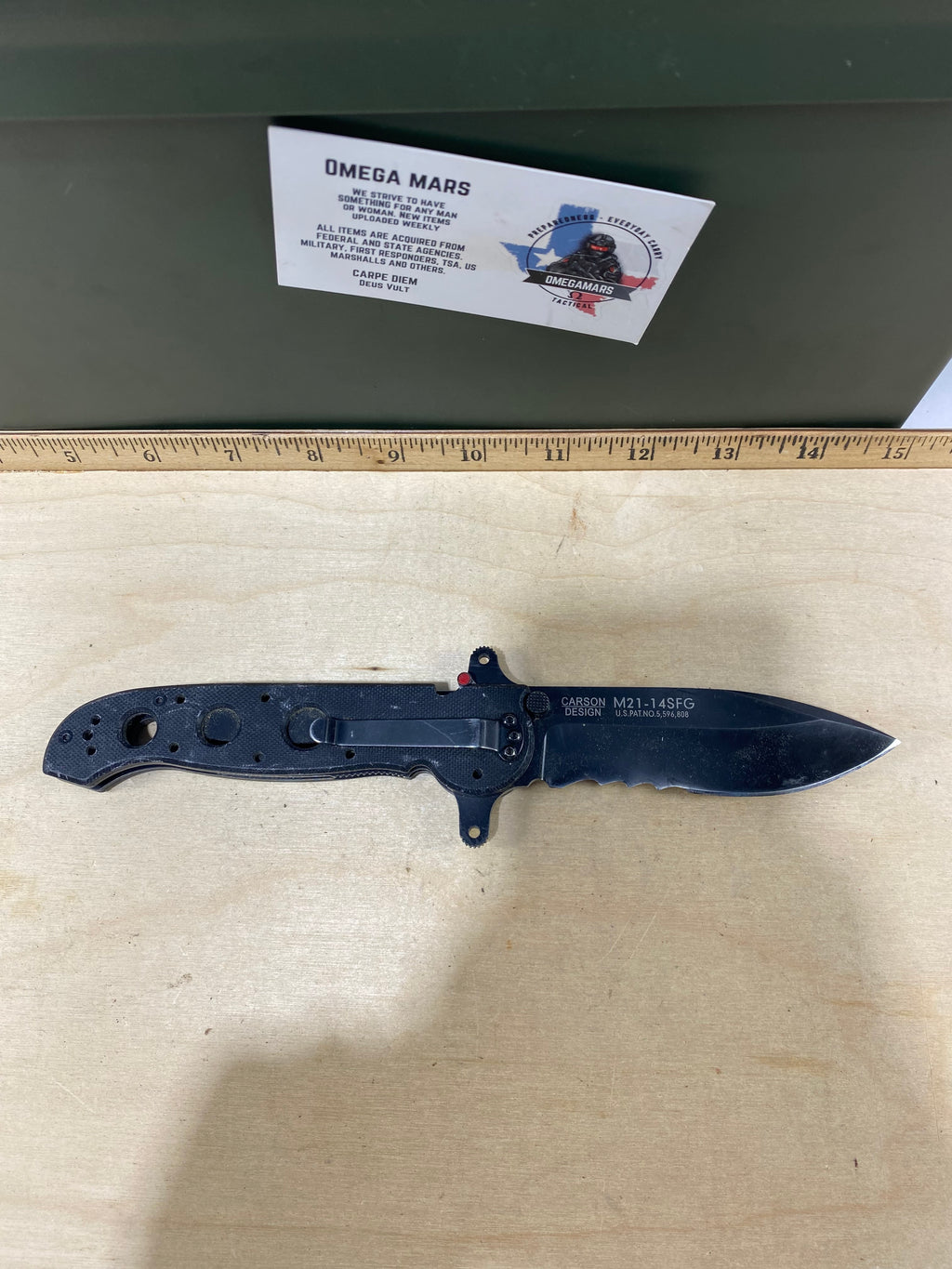CRKT M21-14SFG Spear Point #127. Light usage.