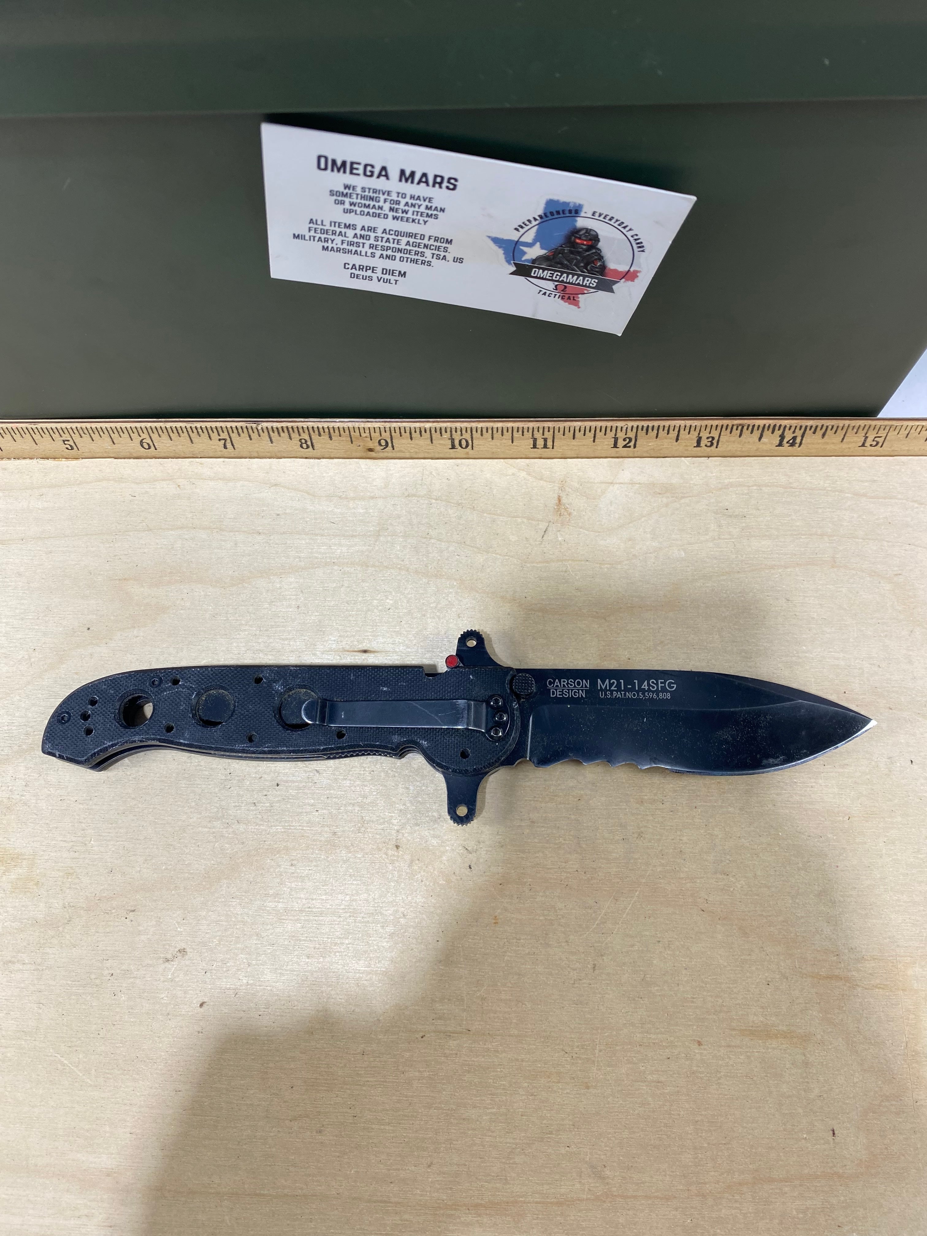 CRKT M21-14SFG Spear Point #127. Light usage.