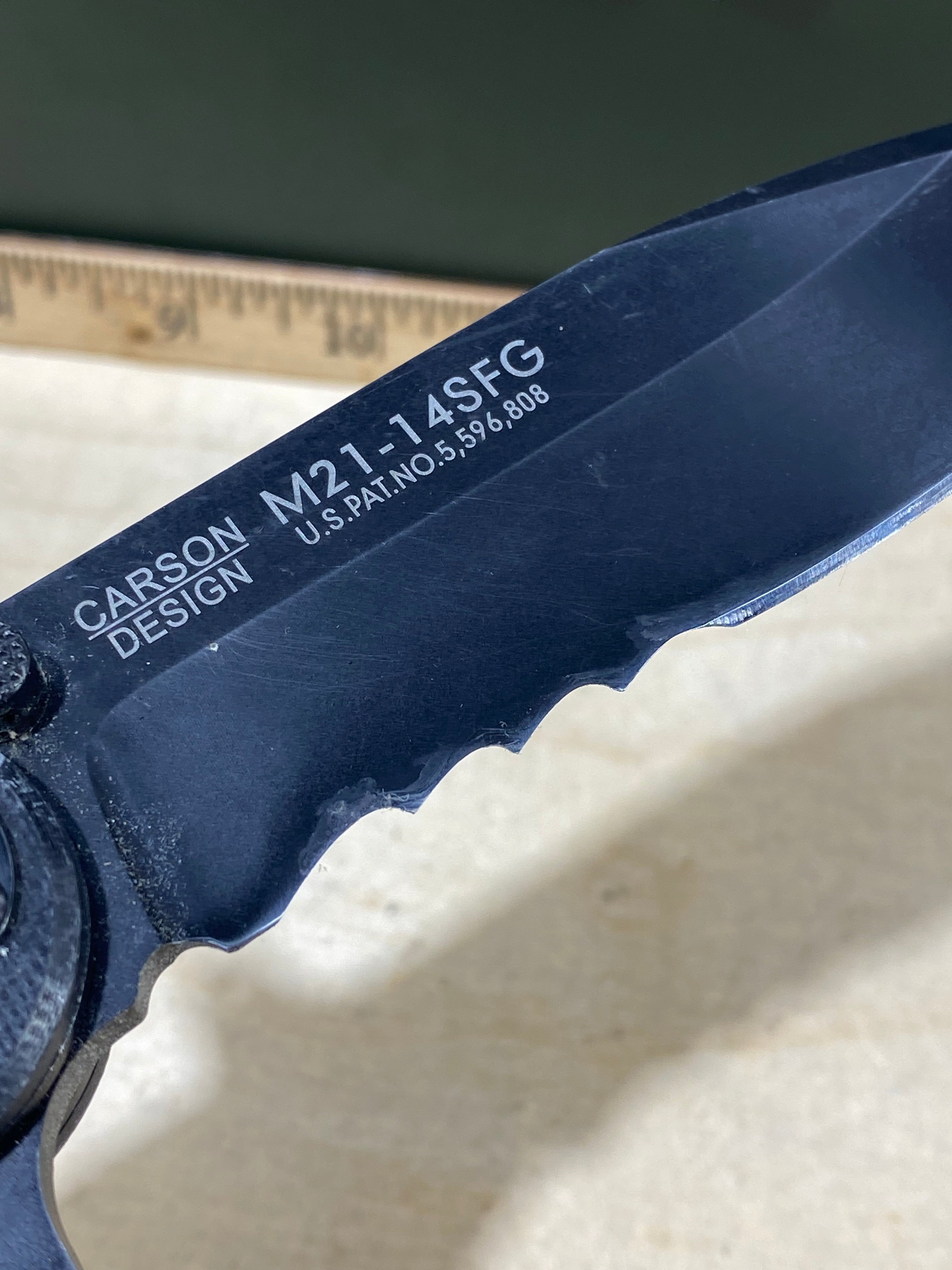CRKT M21-14SFG Spear Point #127. Light usage.
