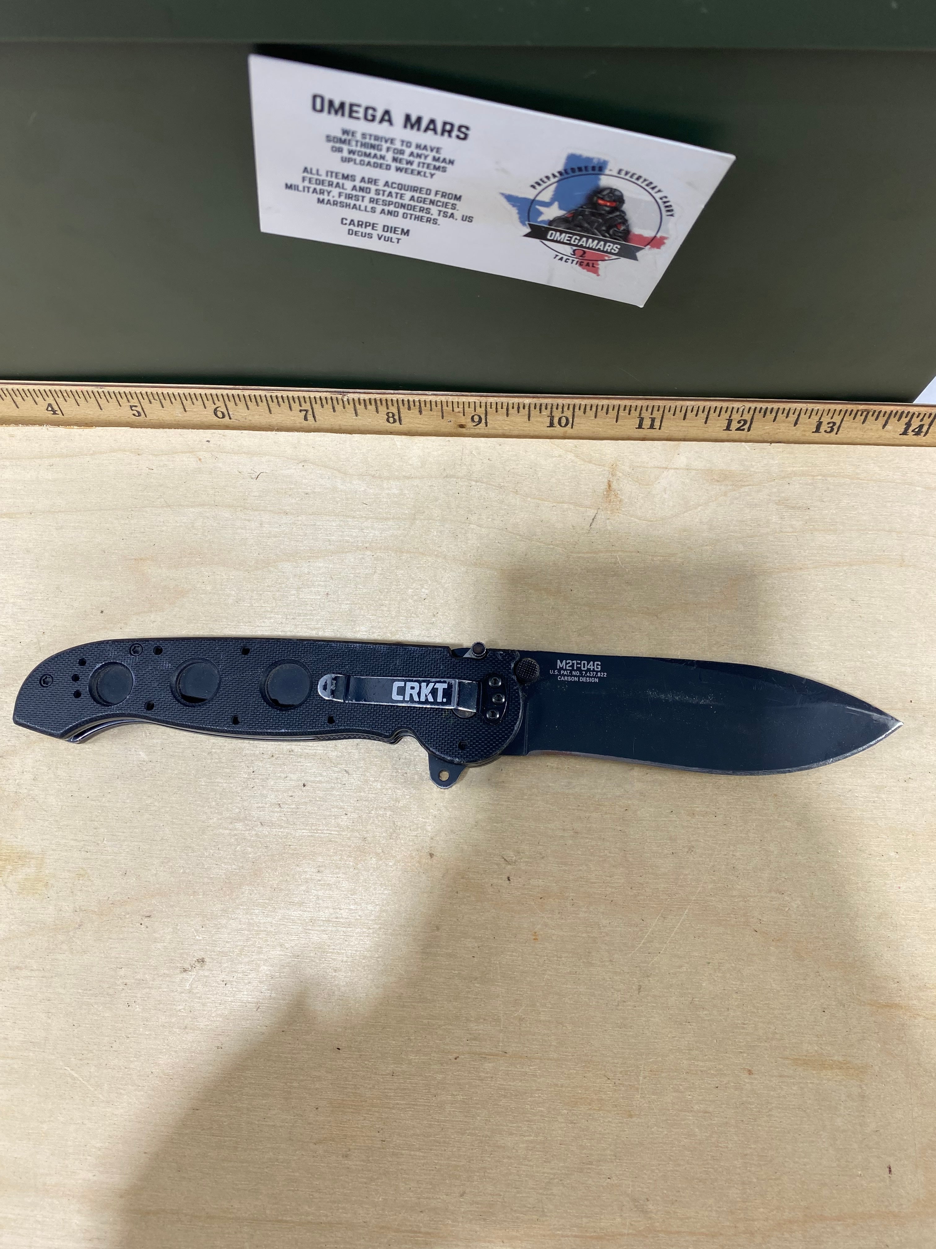 CRKT M21-04G Spear Point #141. Light usage. Resharpened