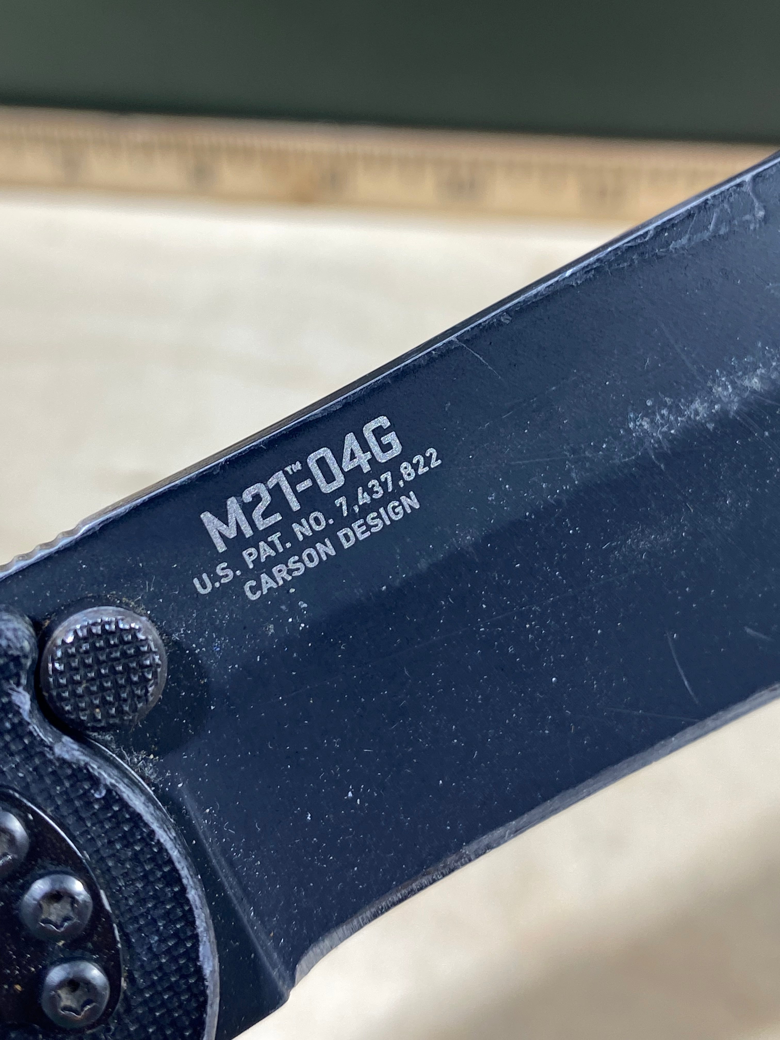 CRKT M21-04G Spear Point #141. Light usage. Resharpened