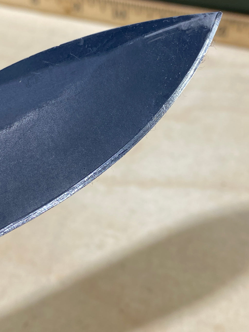 CRKT M21-04G Spear Point #141. Light usage. Resharpened