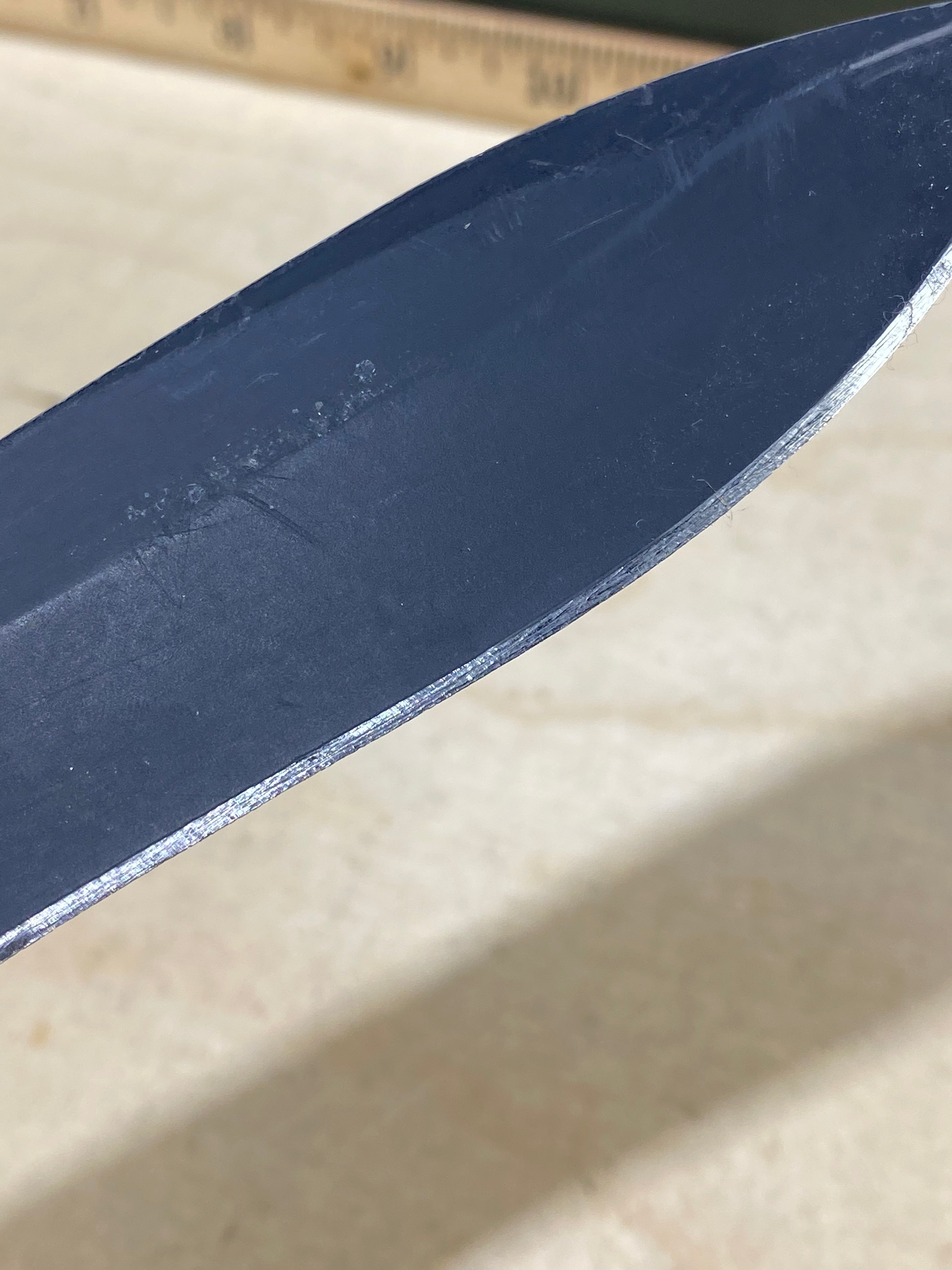 CRKT M21-04G Spear Point #141. Light usage. Resharpened