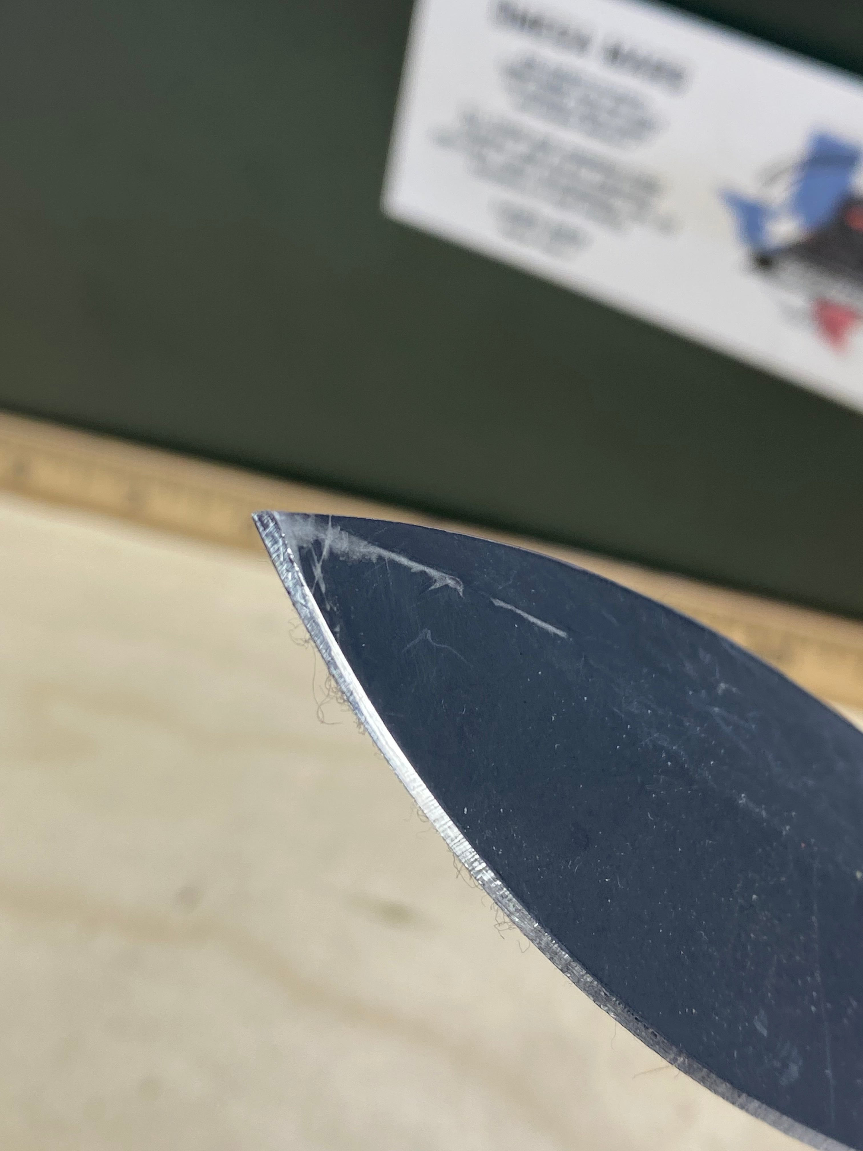CRKT M21-04G Spear Point #141. Light usage. Resharpened