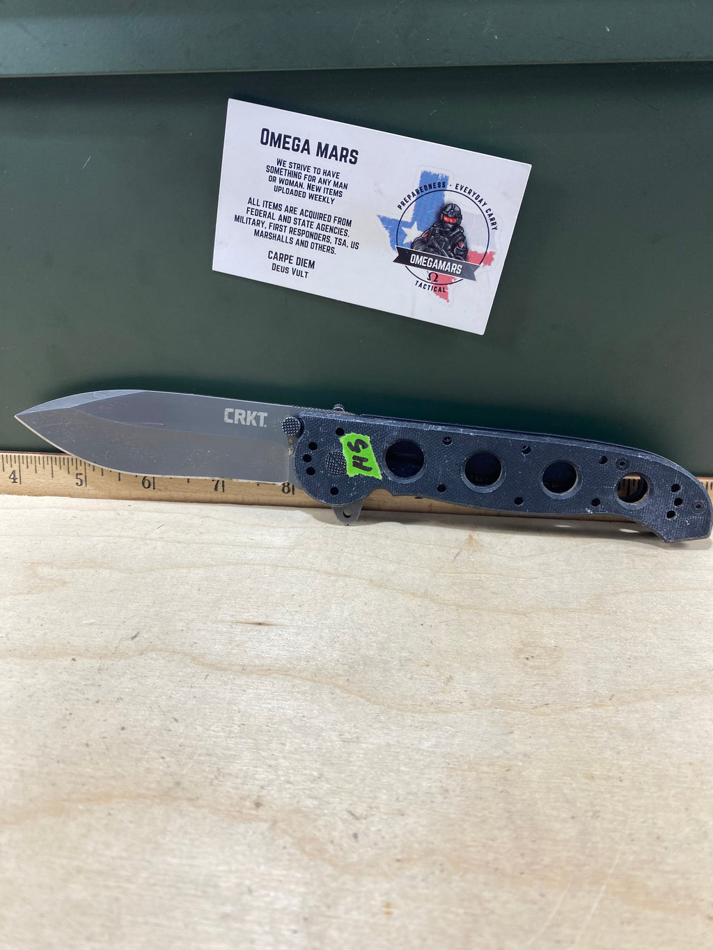CRKT M21-04G Spear Point #145. Light usage. Resharpened