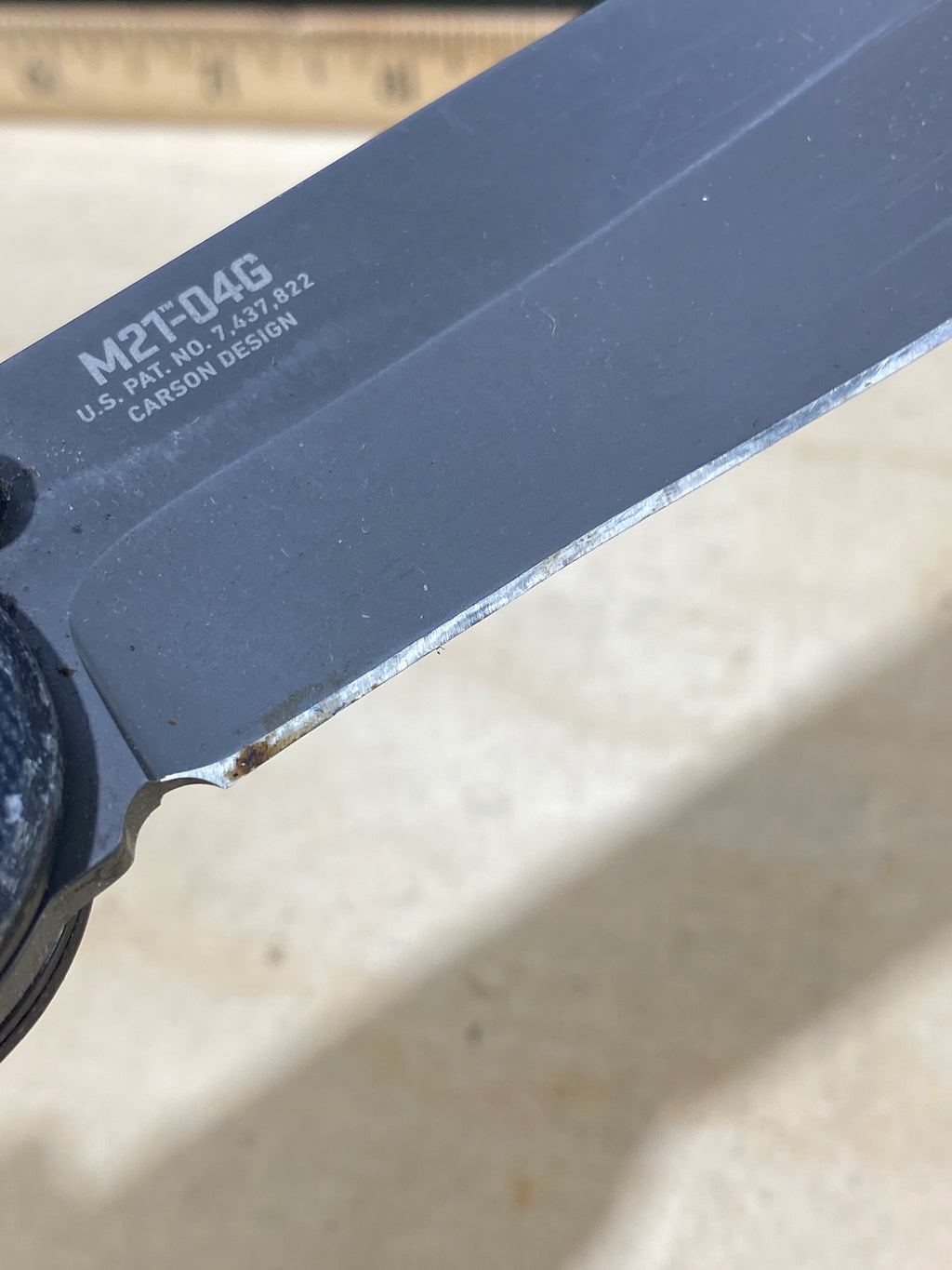 CRKT M21-04G Spear Point #145. Light usage. Resharpened