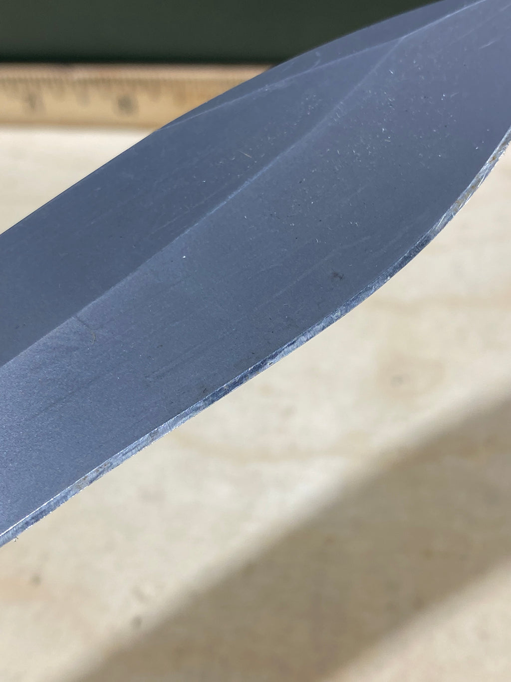 CRKT M21-04G Spear Point #145. Light usage. Resharpened