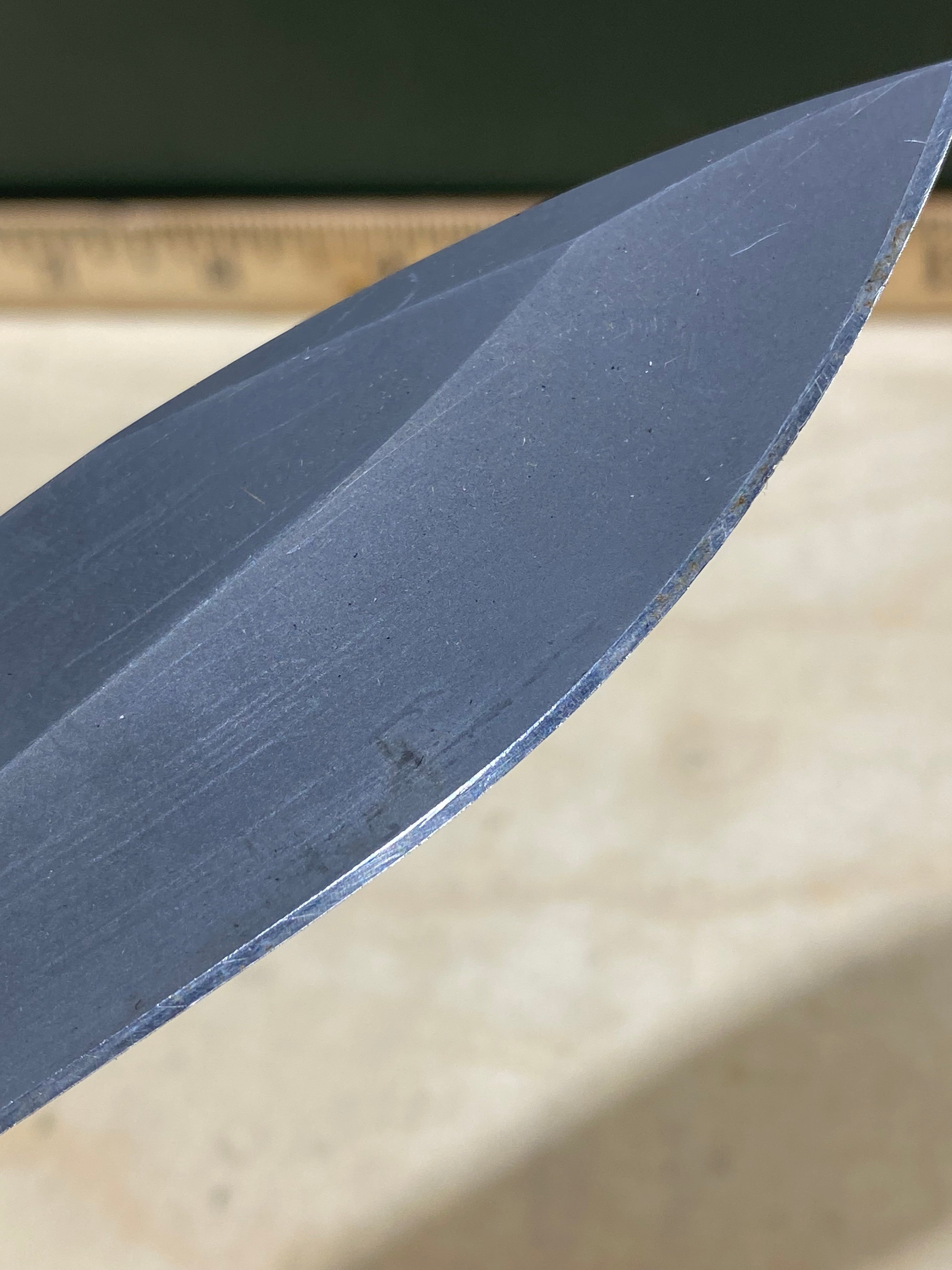 CRKT M21-04G Spear Point #145. Light usage. Resharpened