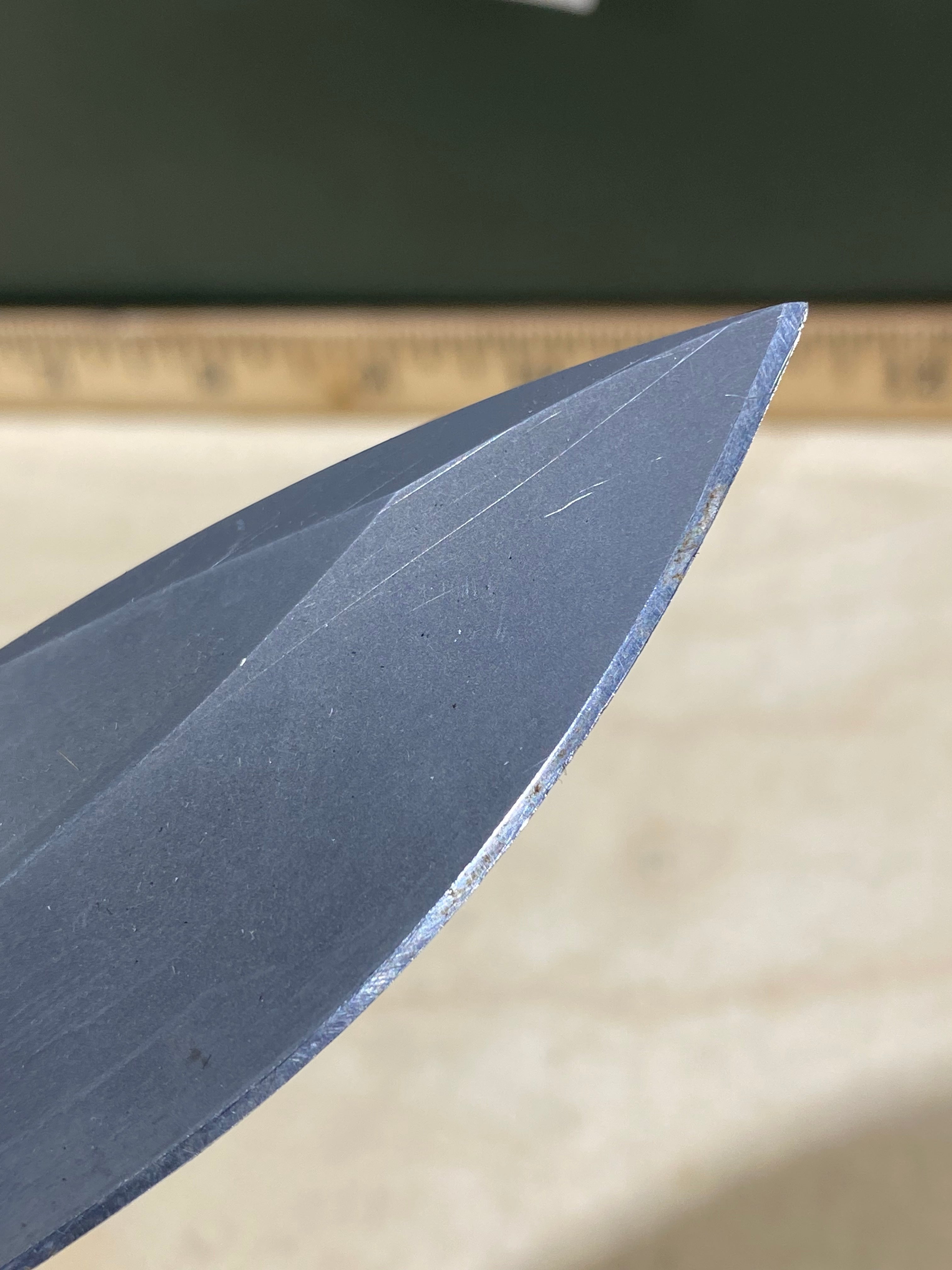 CRKT M21-04G Spear Point #145. Light usage. Resharpened