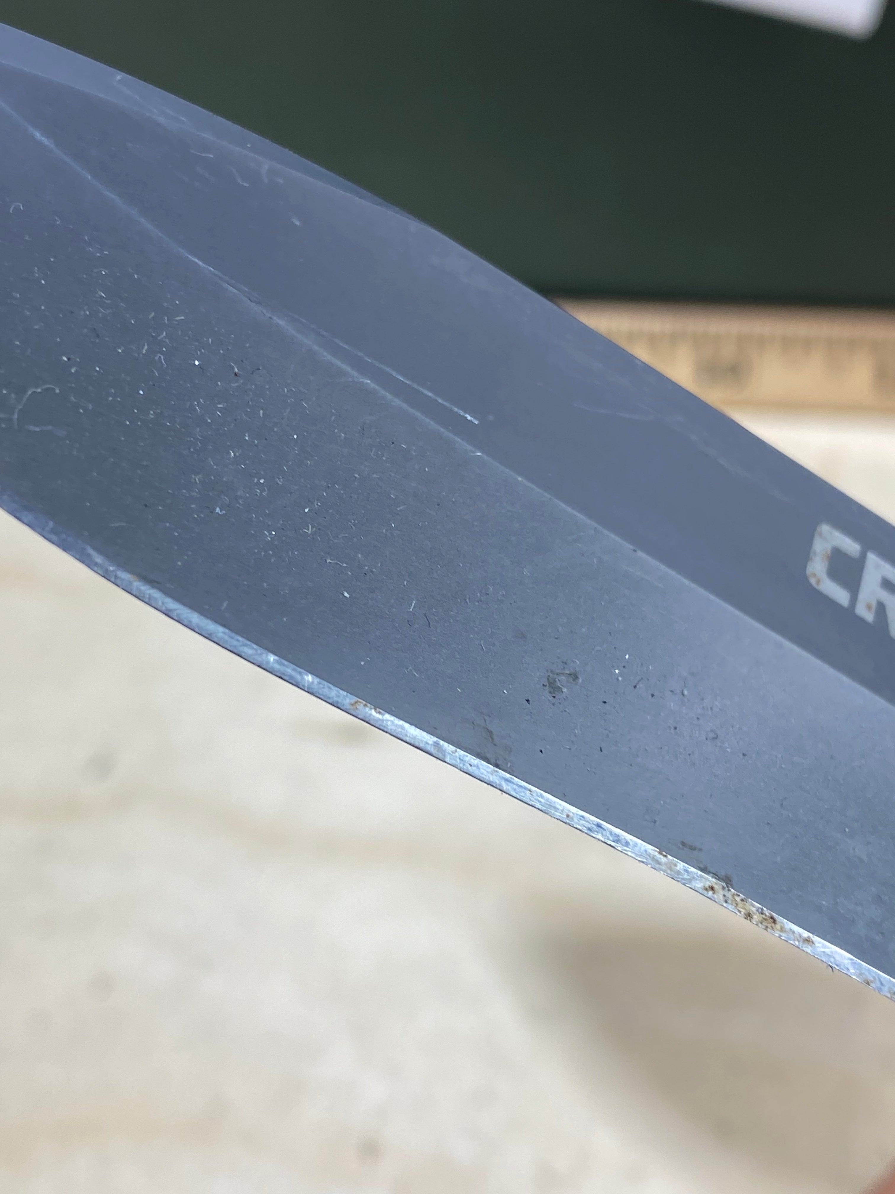 CRKT M21-04G Spear Point #145. Light usage. Resharpened