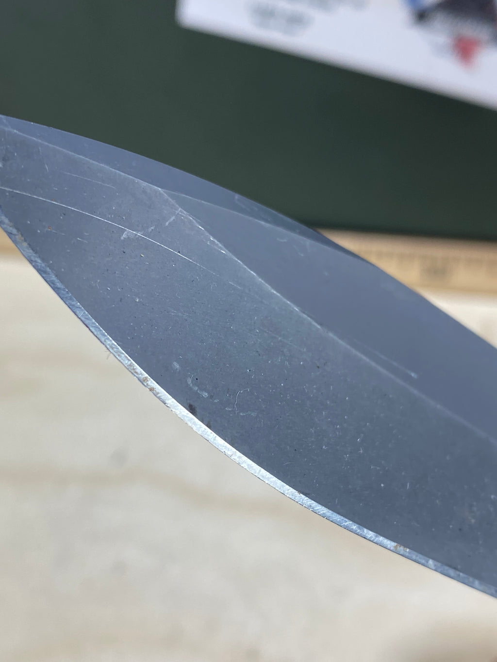 CRKT M21-04G Spear Point #145. Light usage. Resharpened