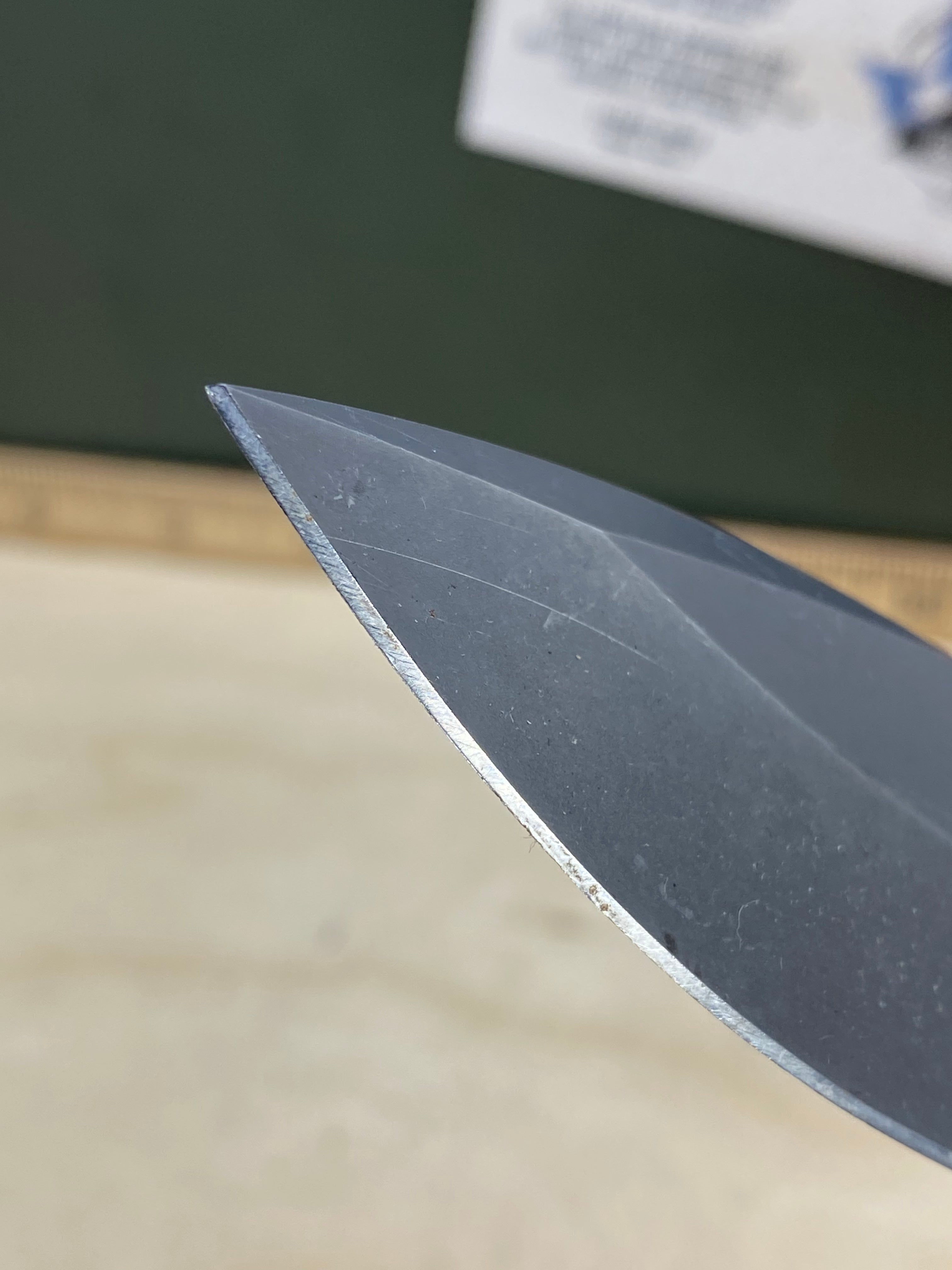 CRKT M21-04G Spear Point #145. Light usage. Resharpened