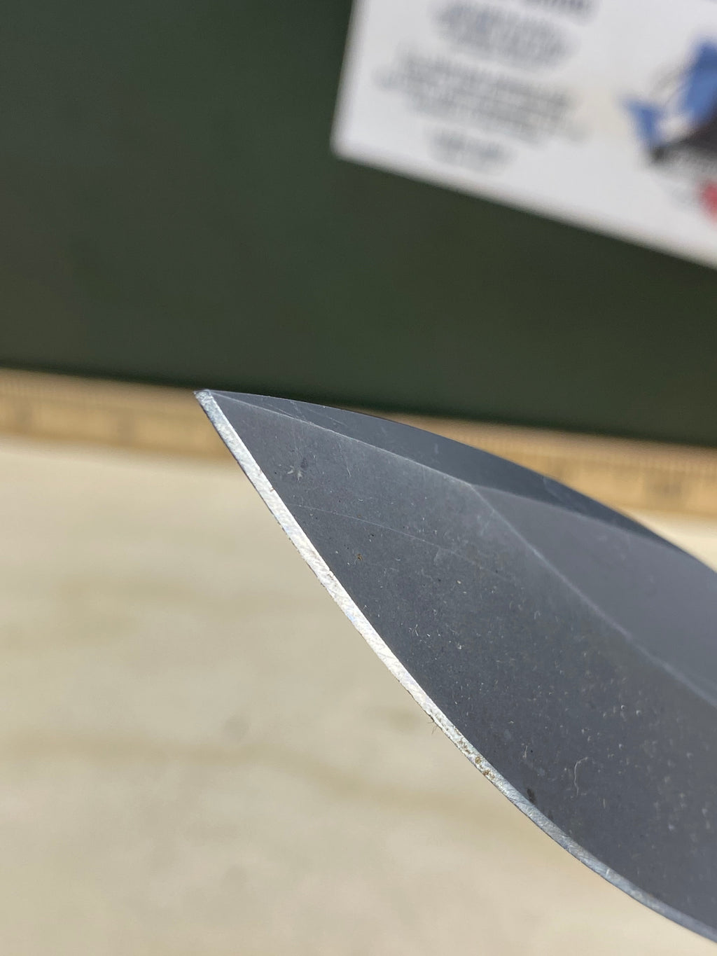CRKT M21-04G Spear Point #145. Light usage. Resharpened