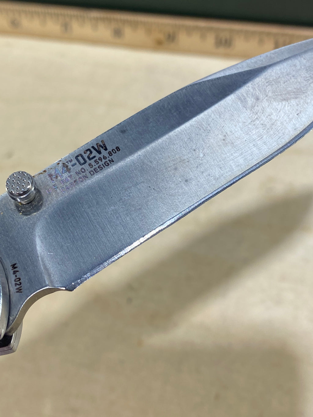CRKT M4-02W #-6. Light usage. Chips on blade. Discontinued