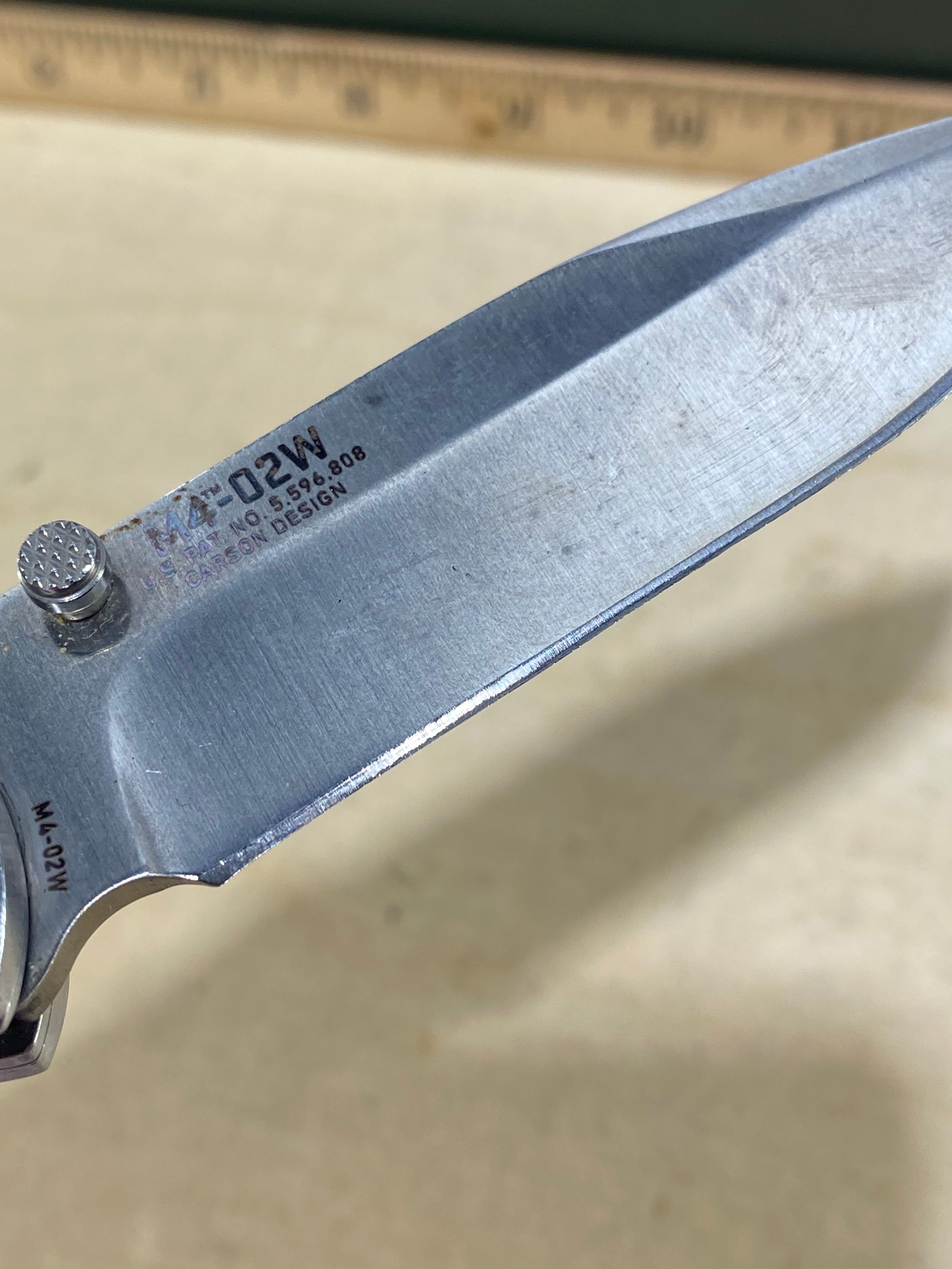 CRKT M4-02W #-6. Light usage. Chips on blade. Discontinued