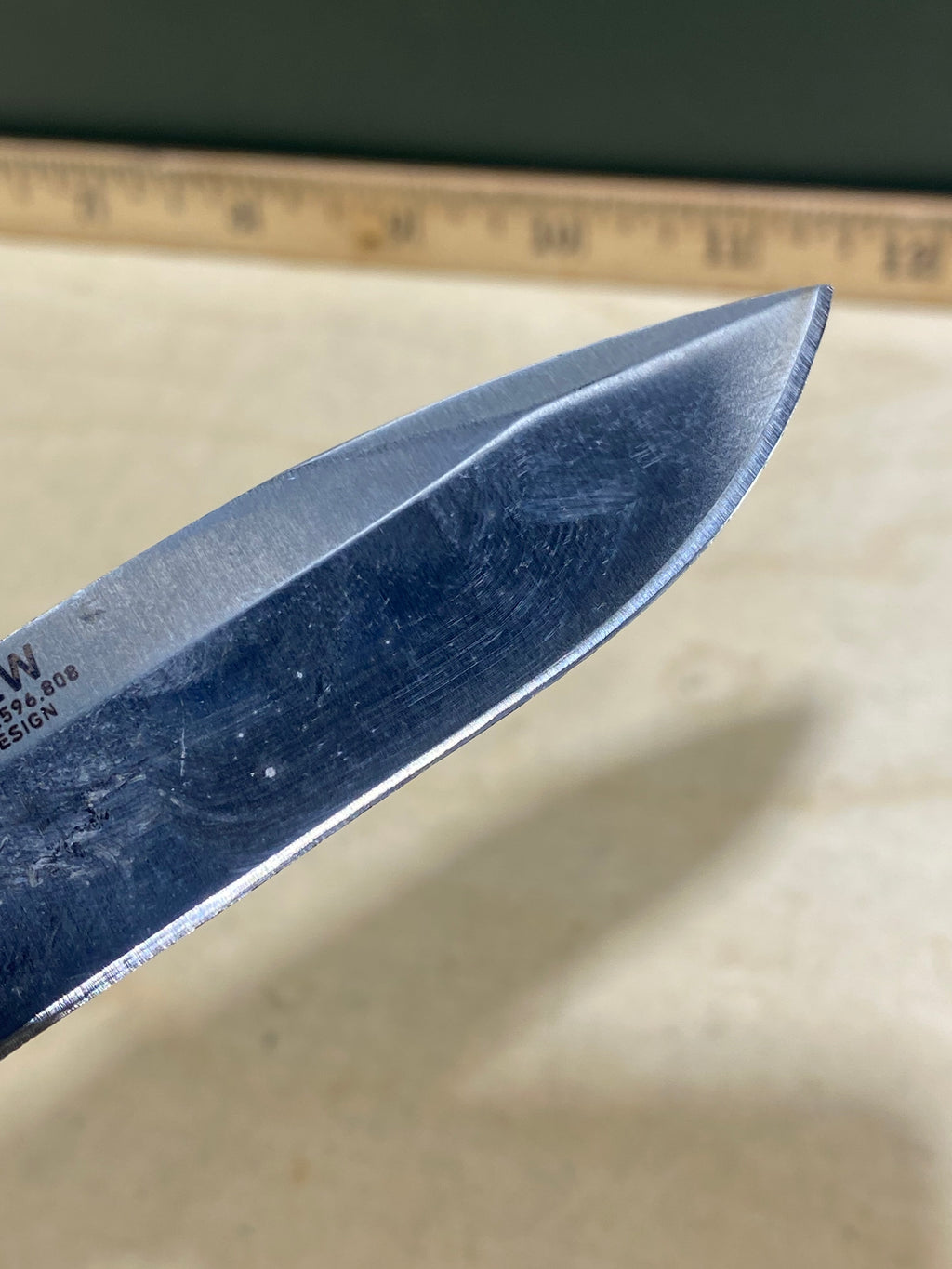 CRKT M4-02W #-6. Light usage. Chips on blade. Discontinued