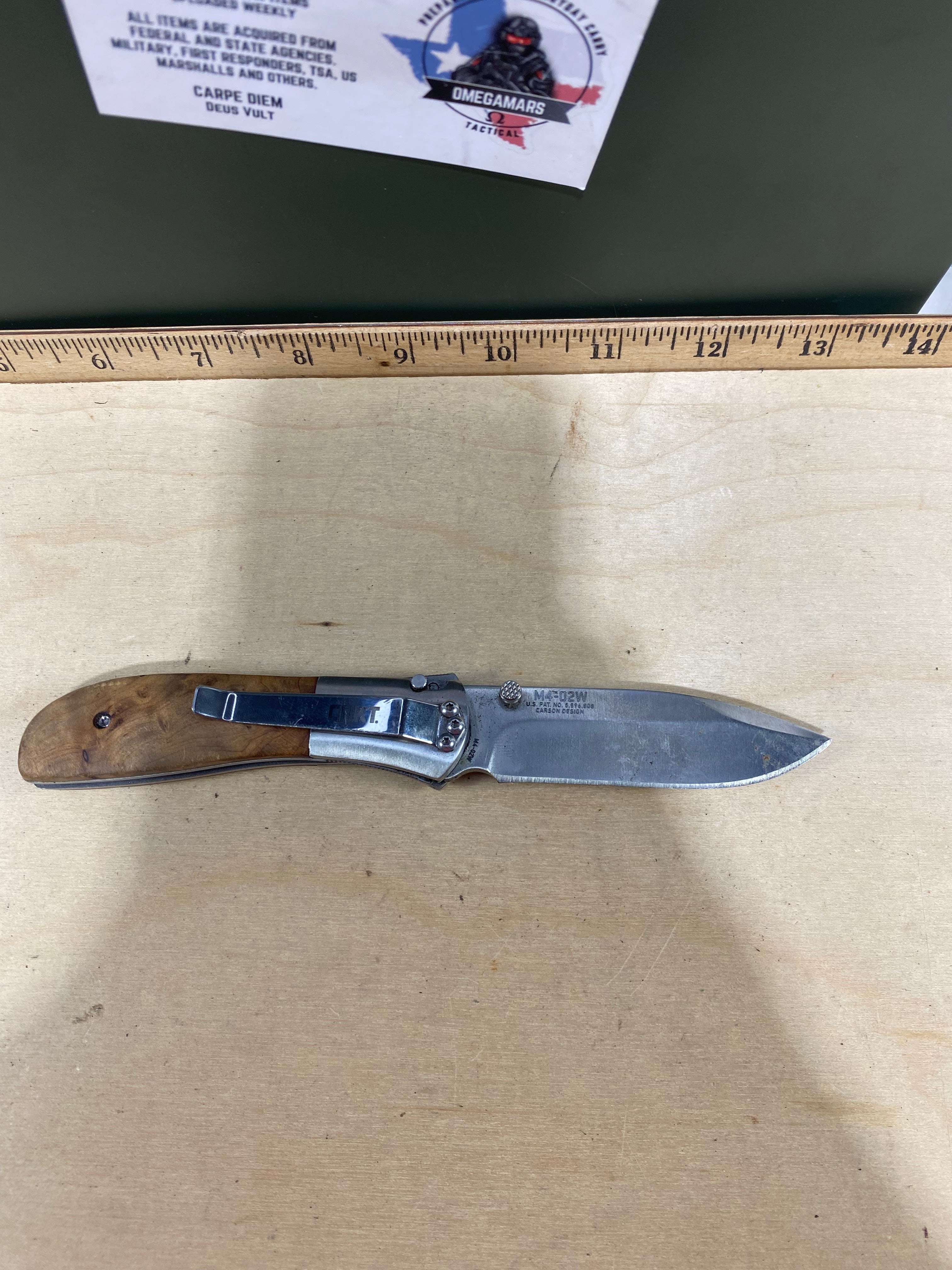 CRKT M4-02W #-7. Light usage. Dirty. Chip on blade. Discontinued.