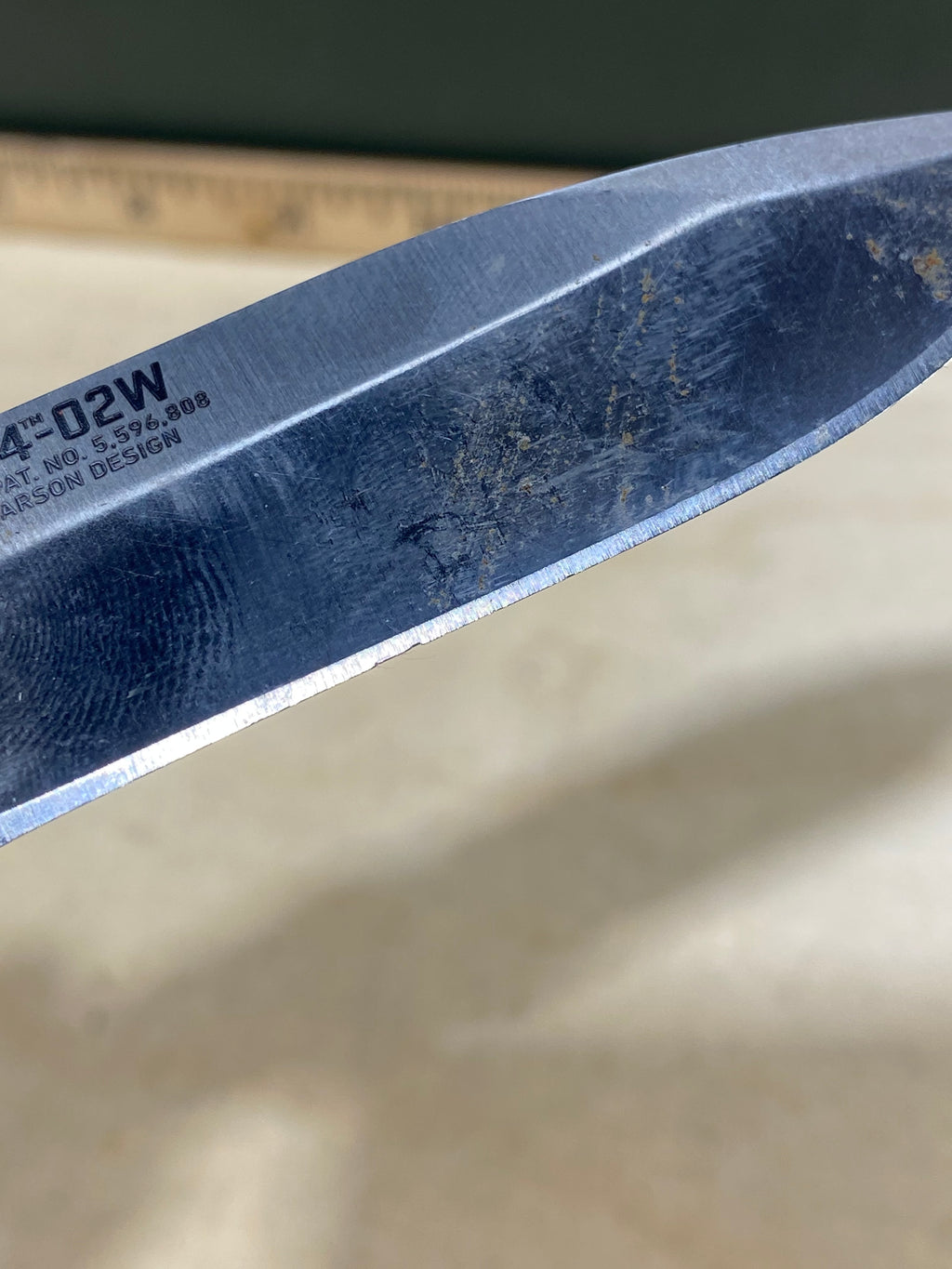 CRKT M4-02W #-7. Light usage. Dirty. Chip on blade. Discontinued.