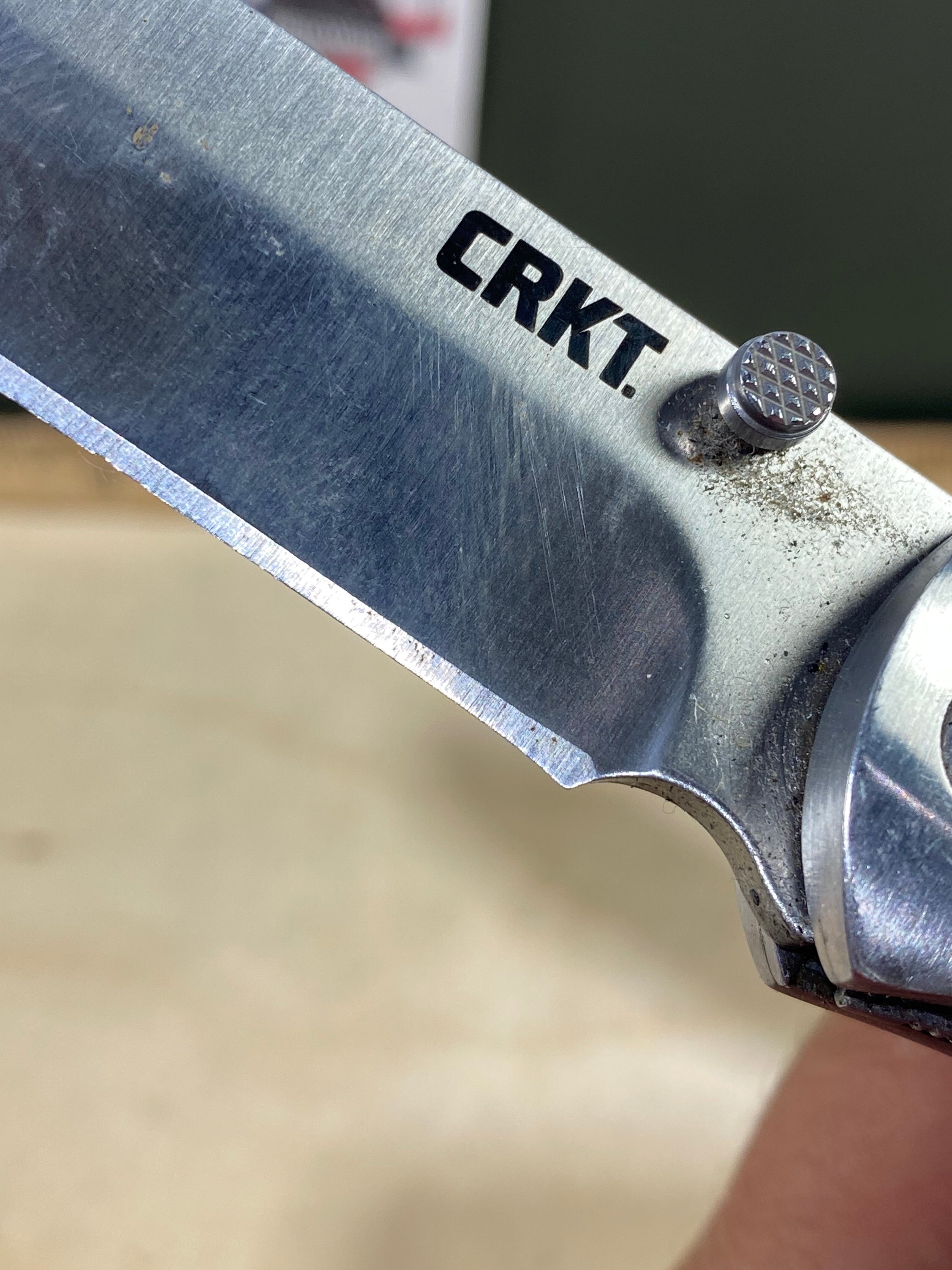CRKT M4-02W #-7. Light usage. Dirty. Chip on blade. Discontinued.