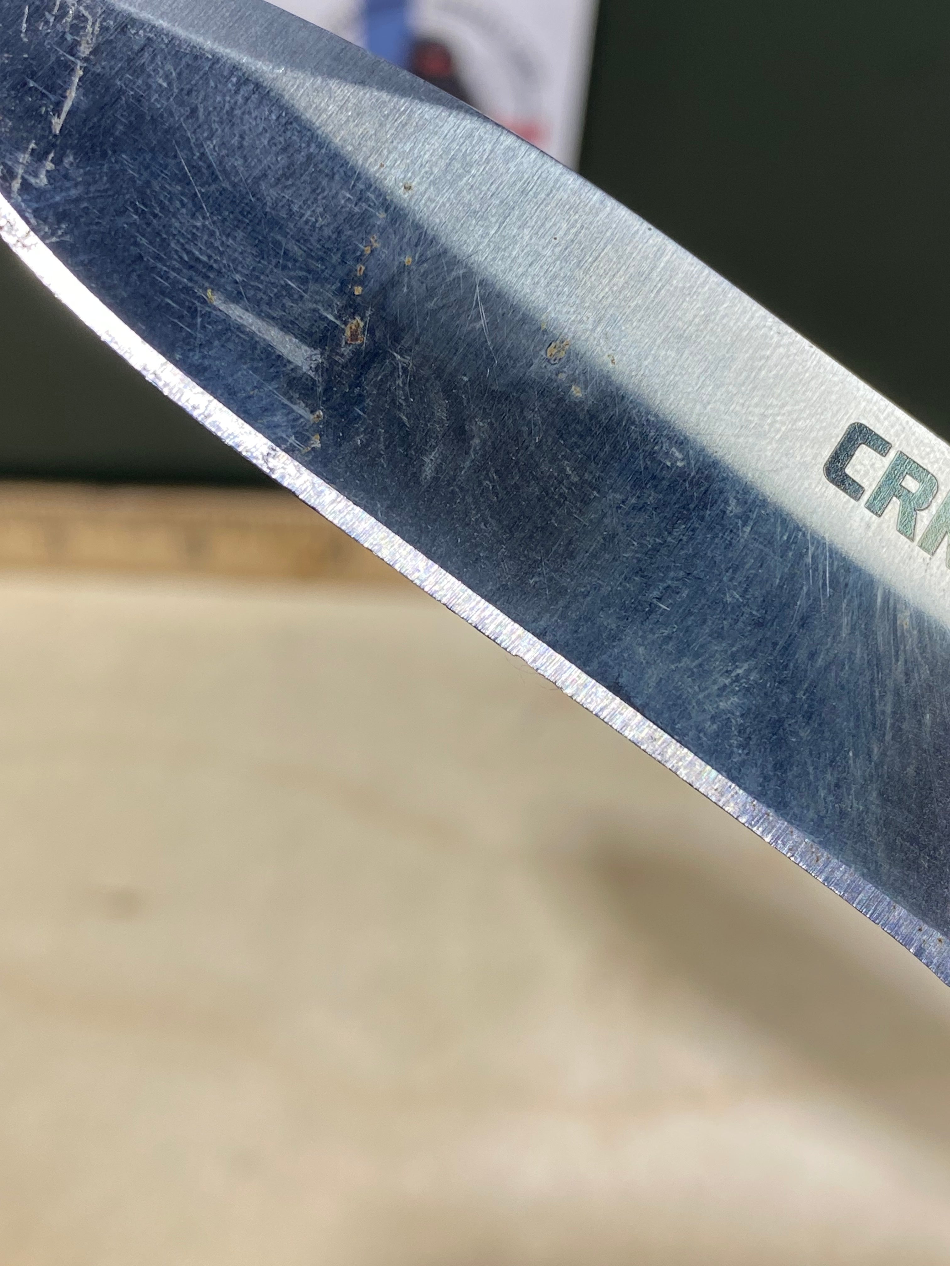 CRKT M4-02W #-7. Light usage. Dirty. Chip on blade. Discontinued.
