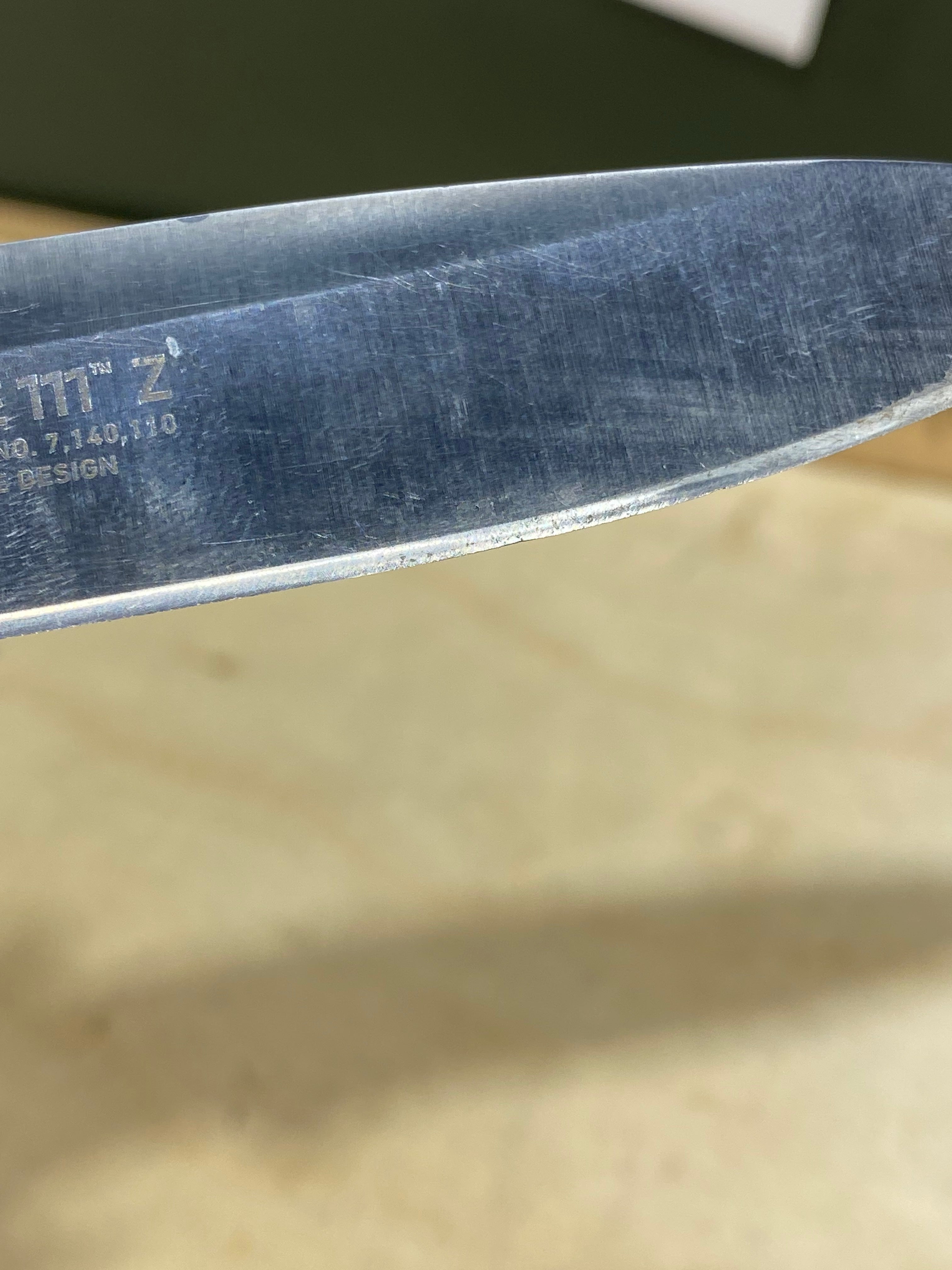 CRKT 7255Z Lake lll #-10. Light usage. Chip on blade. Resharpened. Discontinued.