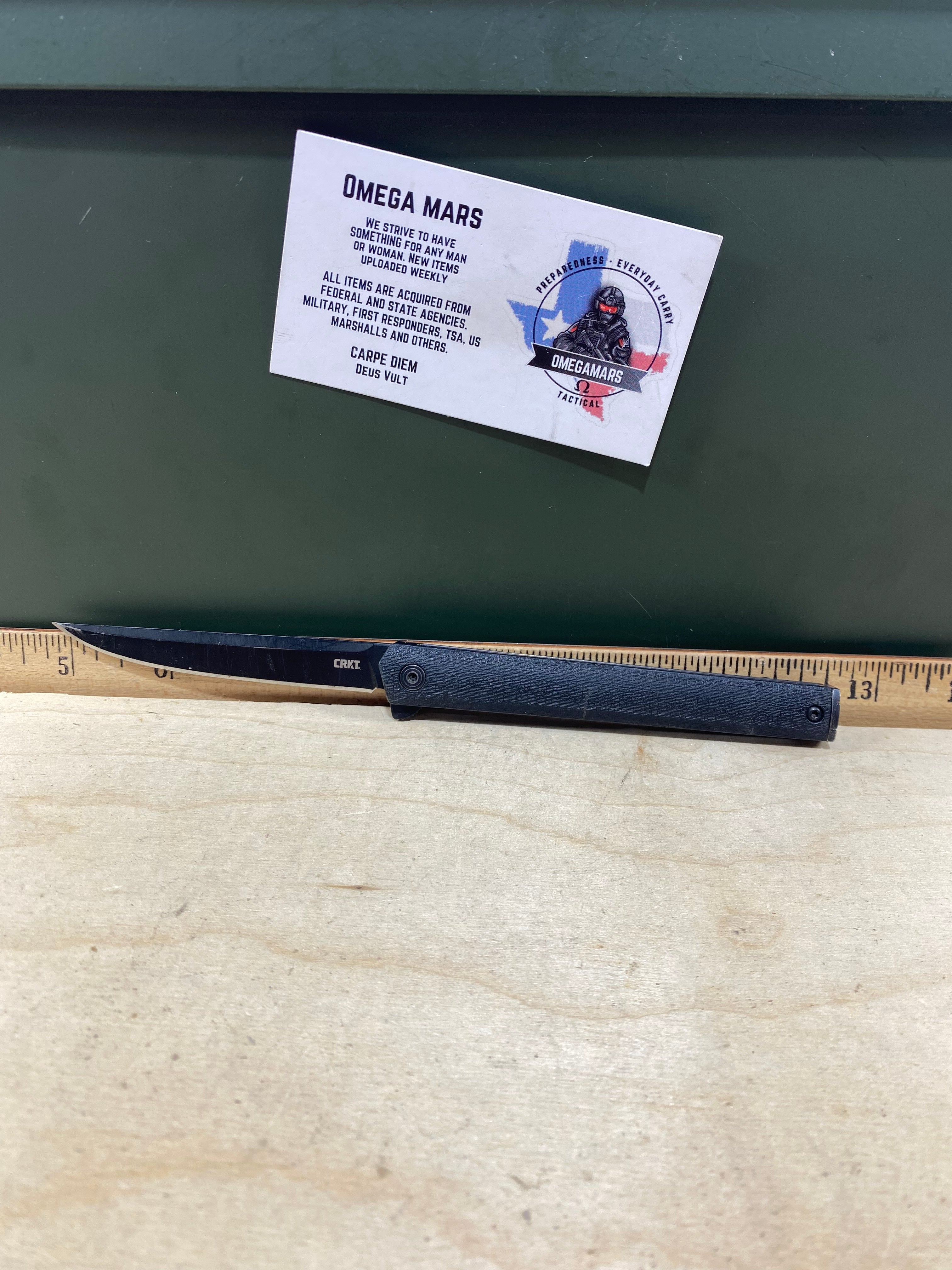 CRKT 7097K #-13. Light usage. Chip on blade