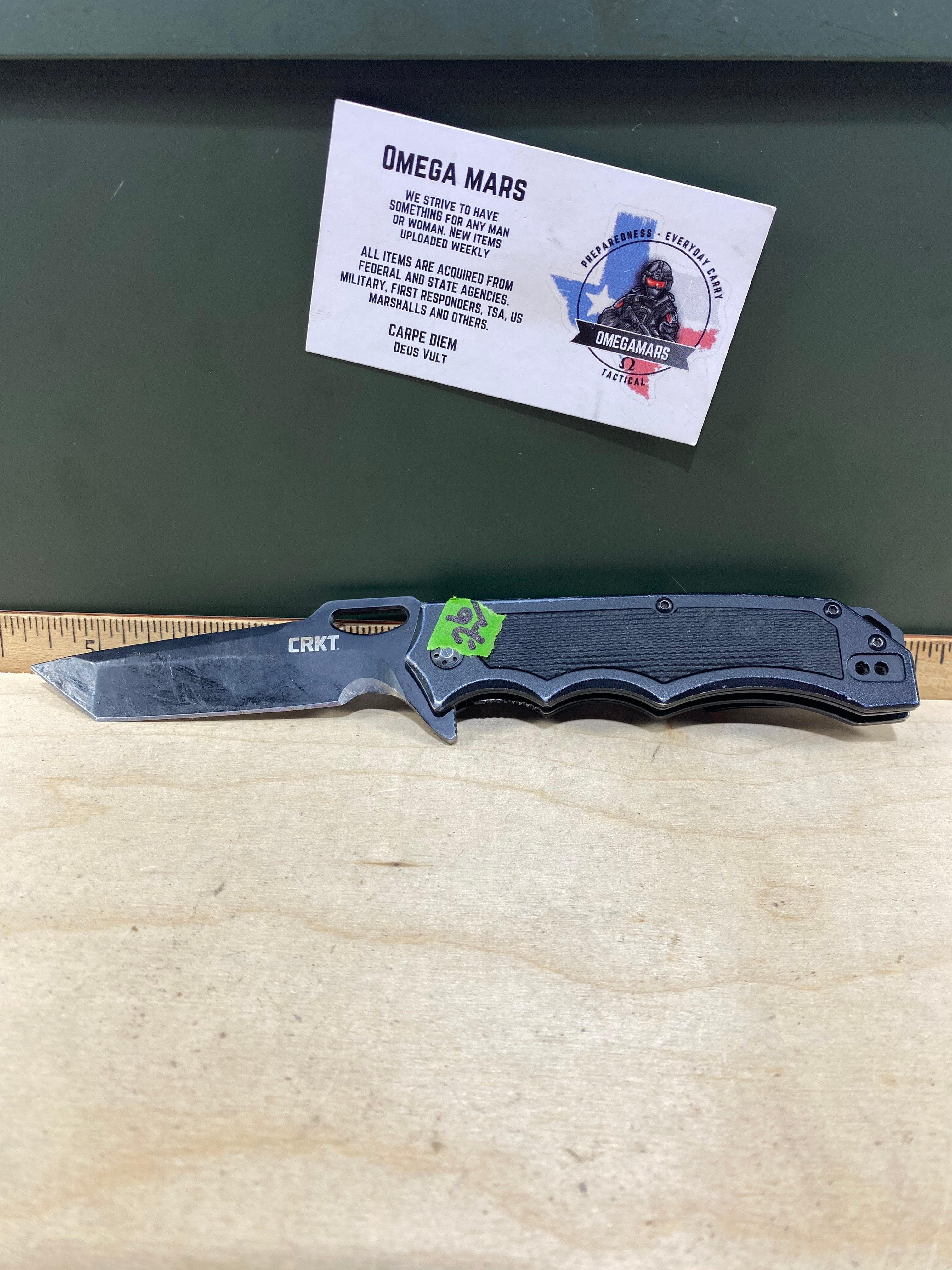 CRKT 7050 Septimo #-26. Light usage. Dirty. Pocket clip it's bent out. Chips on blade. Resharpened.